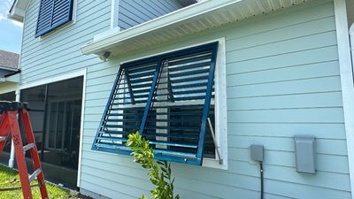 Hurricane Rated Bahama Shutters in Ocean Blue