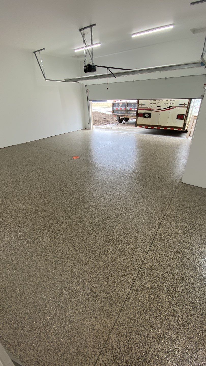 Garage using Cordwood by Select Painting, Coatings & Garage Cabinets