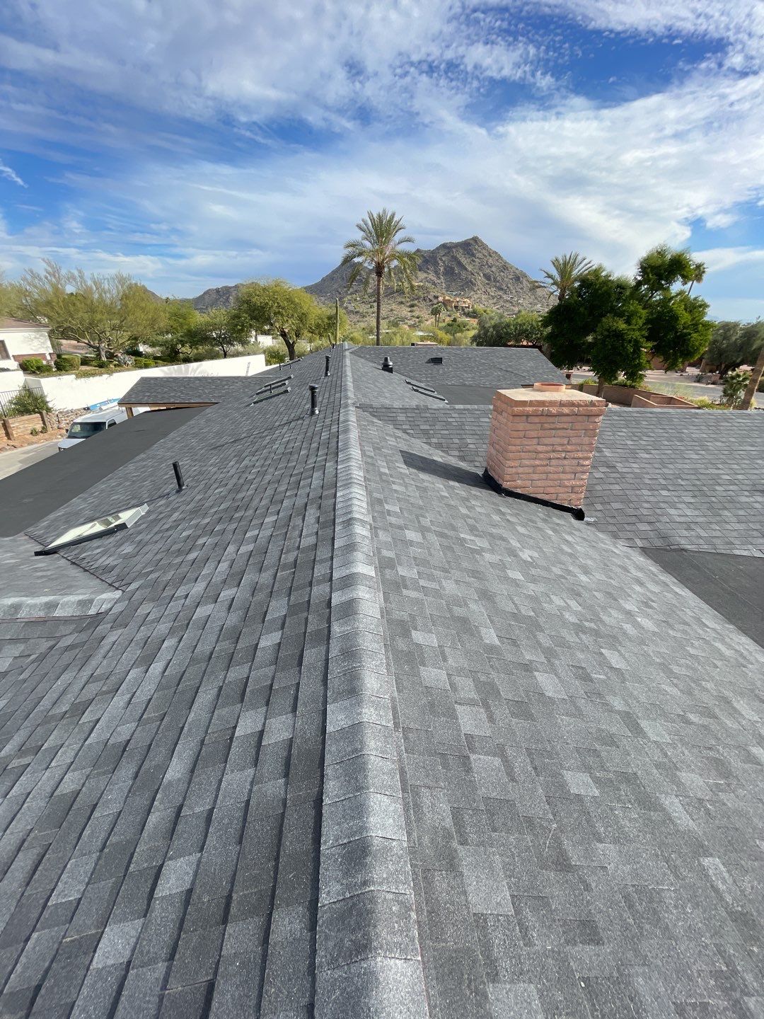 Onyx Black Shingles by Reimagine Roofing
