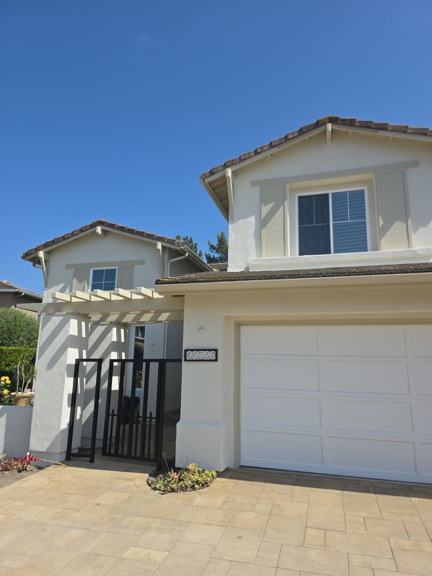Exterior painting of this newly remodeled Mission Viejo home. by Beach City Painting