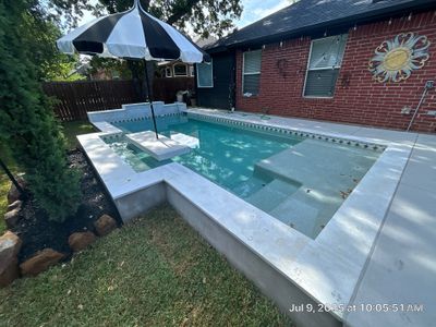 Geometric Pool with Raised Spa and White Coping