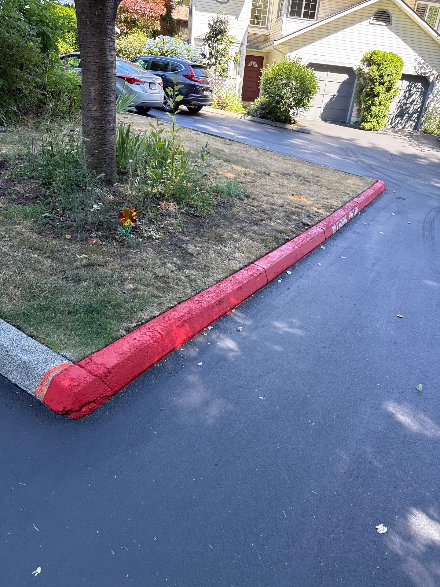 Curb Repaint | Seattle  by Jireh Asphalt & Concrete Inc 