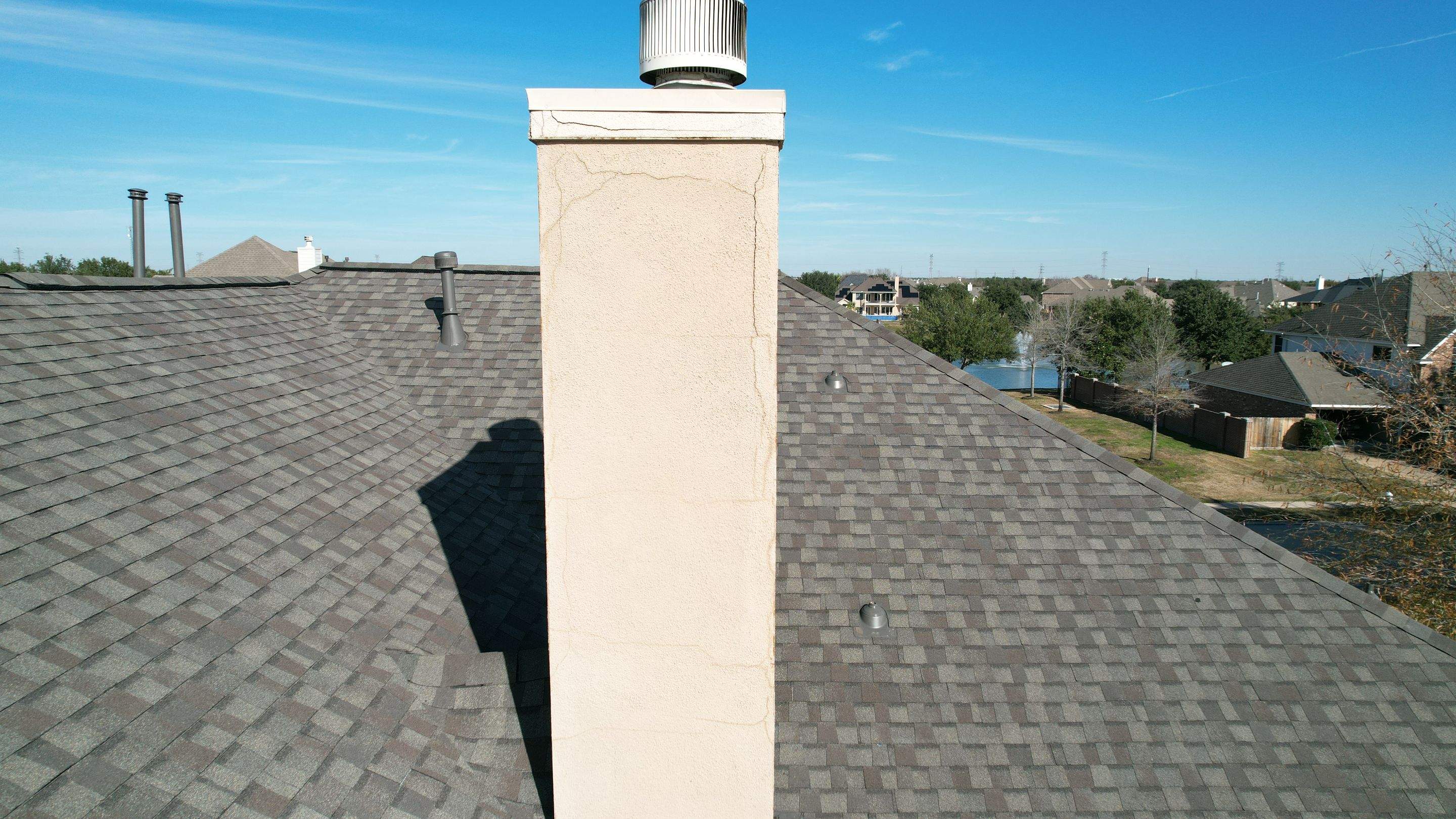 Two-Story Roof Replacement & Chimney Stucco Repair — Houston, TX by PL Roofing & SB Roofing, LLC.