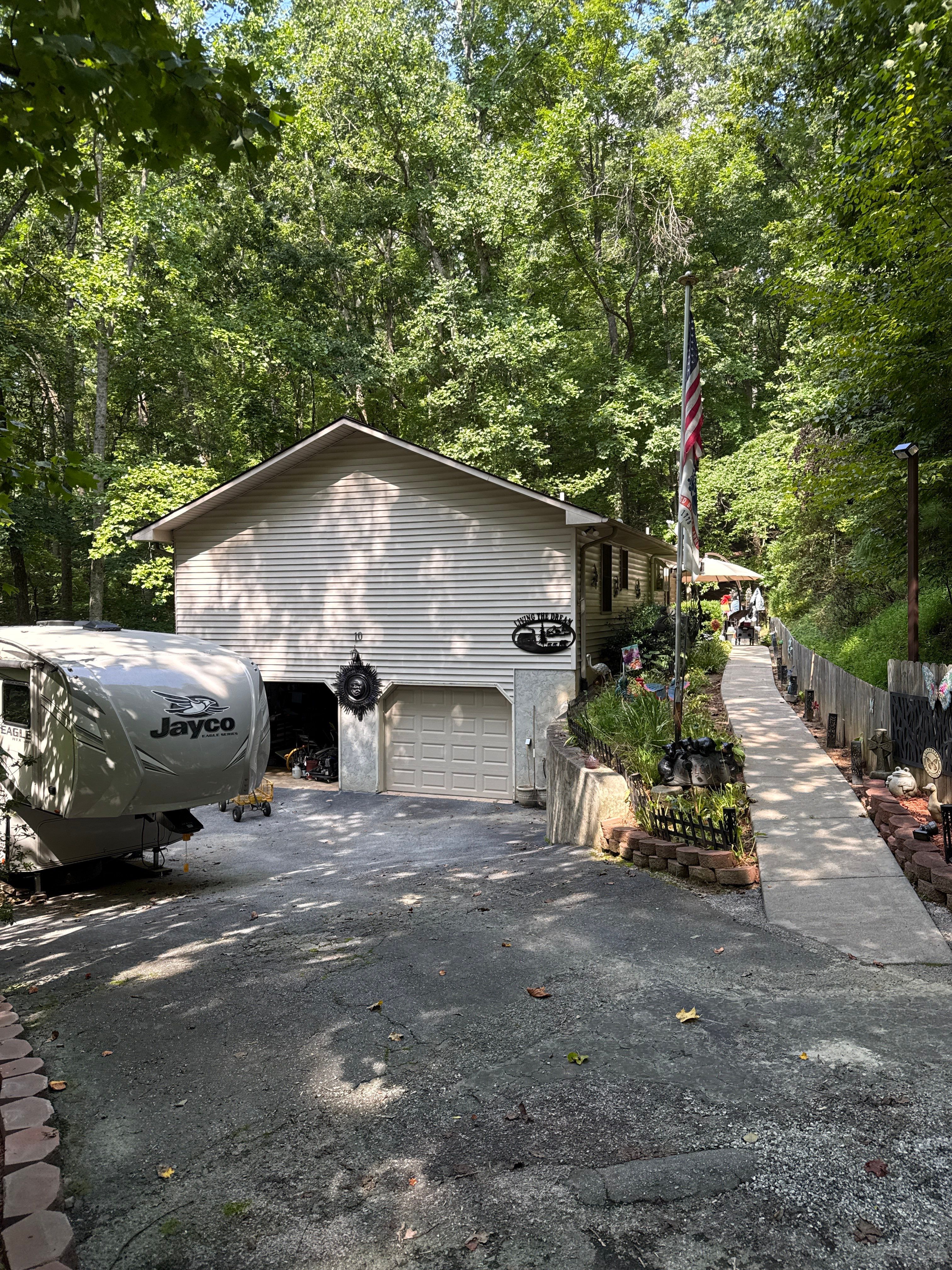 Asphalt Shingle Roof Rejuvenation and Gutter Guard Installation in Hendersonville