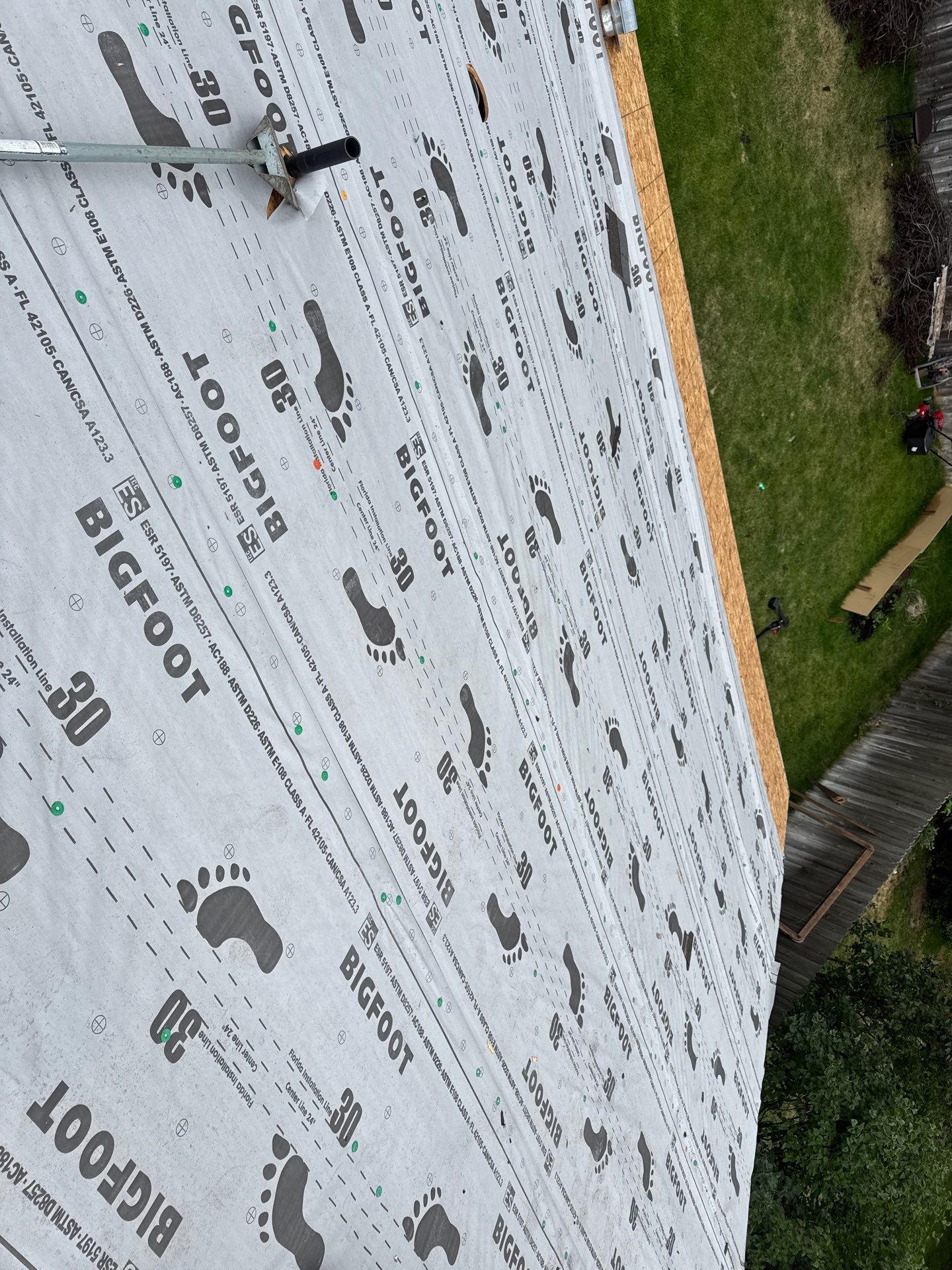 Residential Roof Replacement Featuring Charcoal Grey Architectural Shingles by Olive Roofing