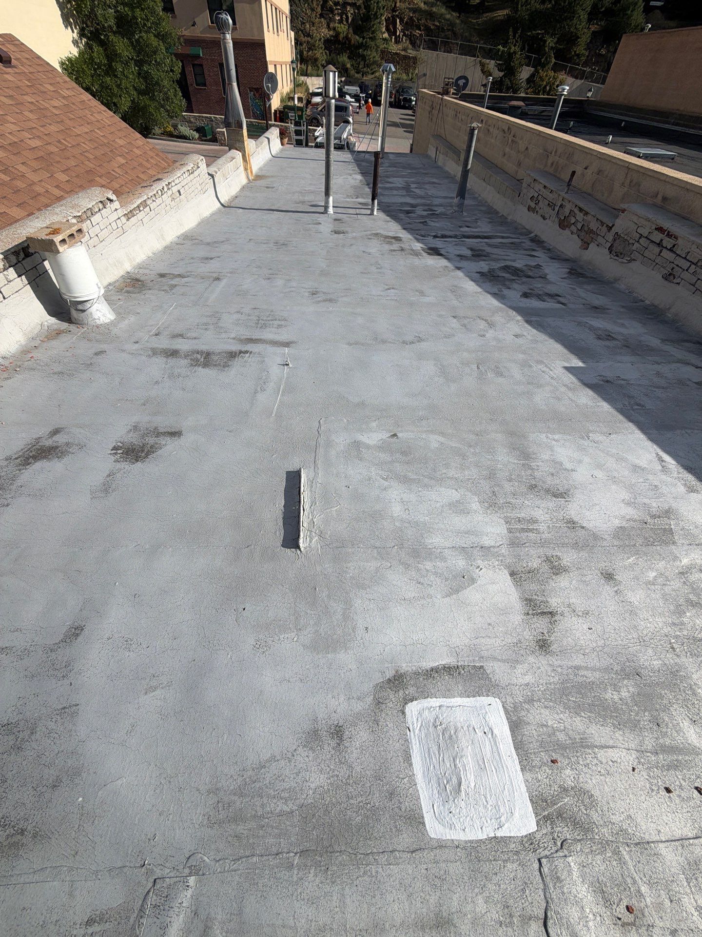 Estes Park "The Taffy Shop" Before & After Gaco Coating by Blue Peaks Roofing LLC