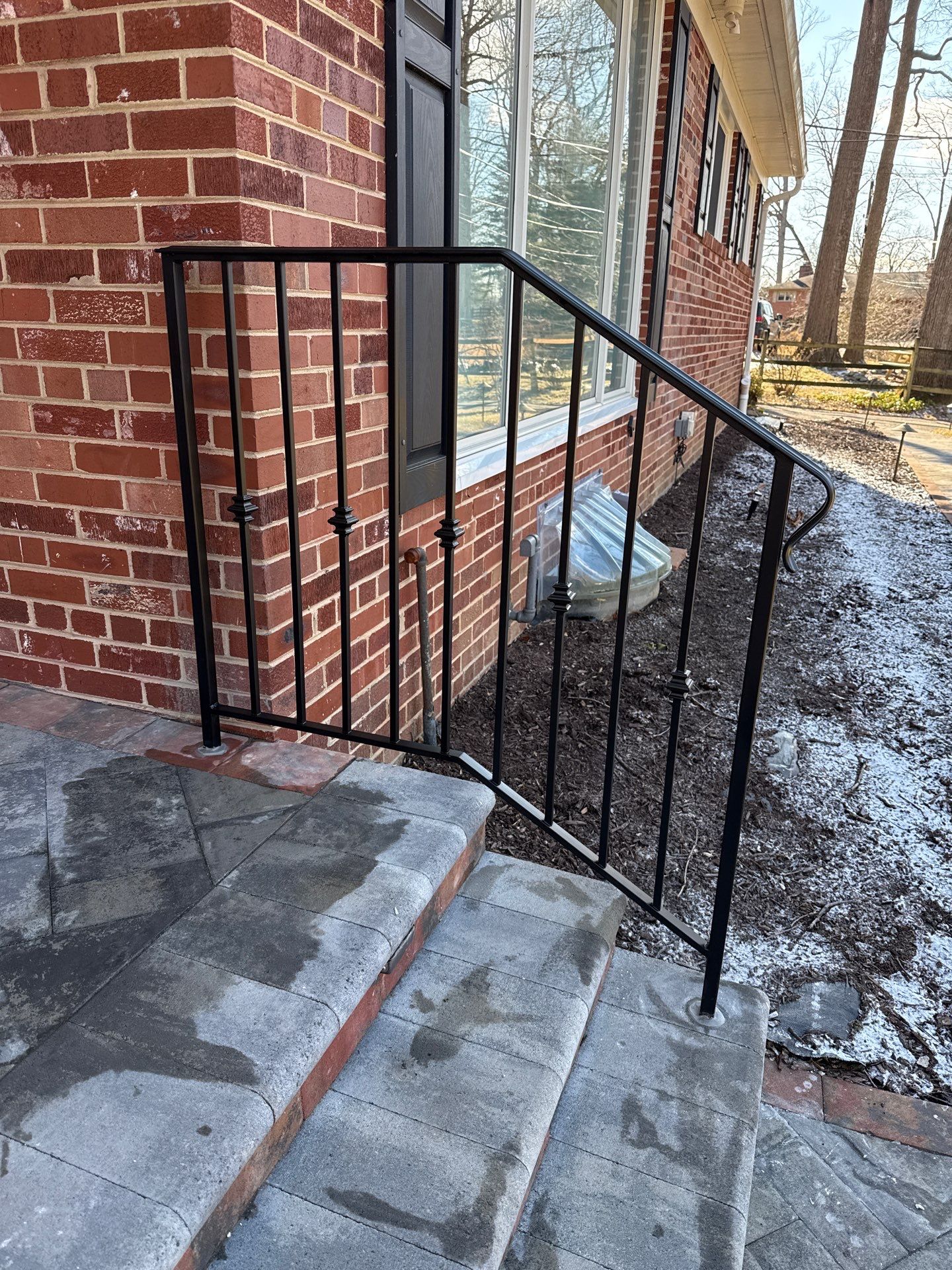 Custom Exterior Iron Railing with Ornamental Detail by Capitol Iron Works
