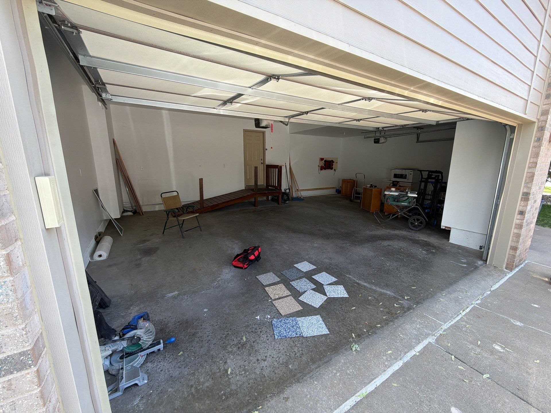 Cabin Fever Garage Floor System in Sioux Falls by Select Painting, Coatings & Garage Cabinets