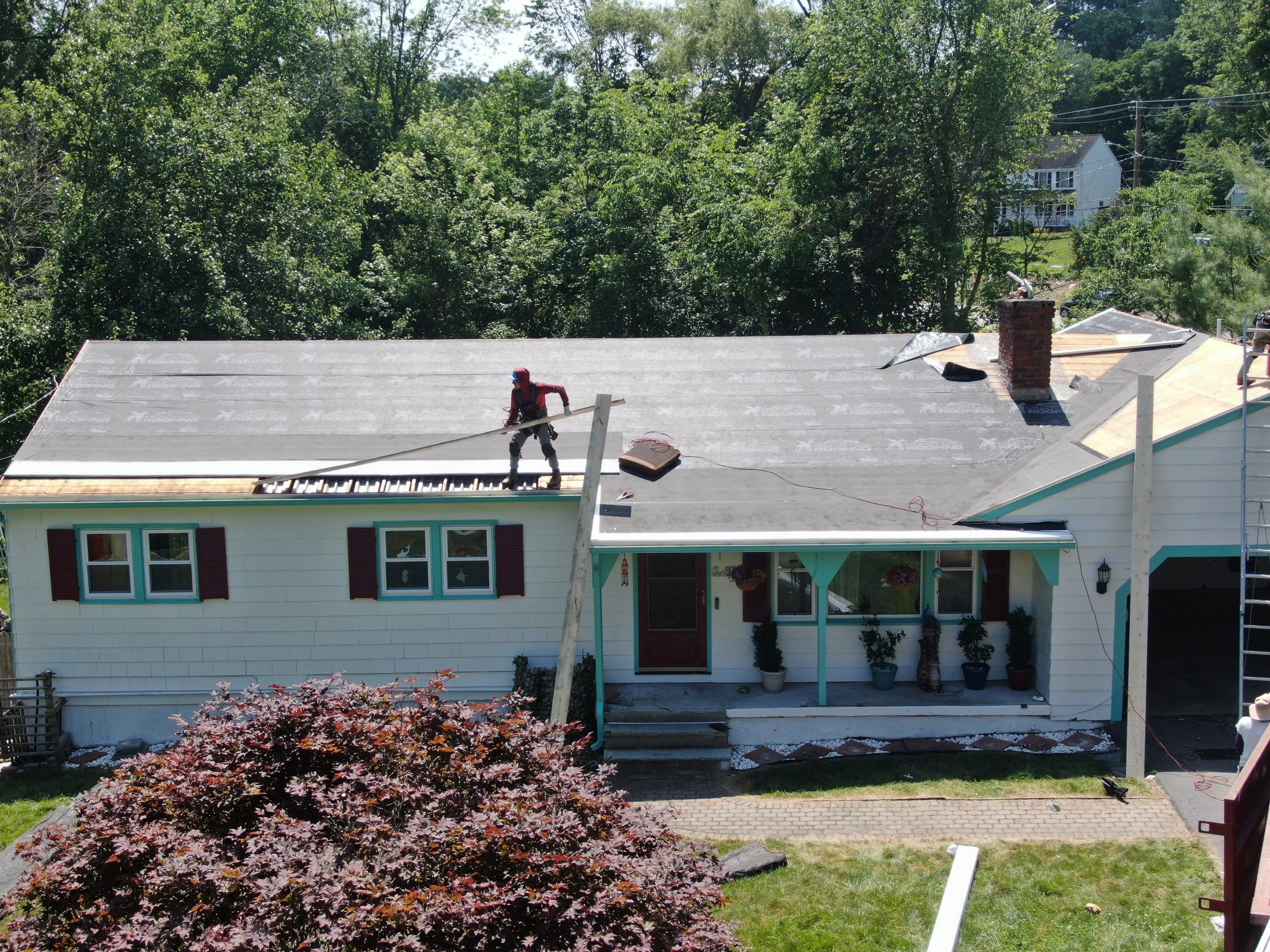 Roof Replacement with Gutter Guards – Westford, MA by Mighty Dog Roofing of Greater Middlesex County