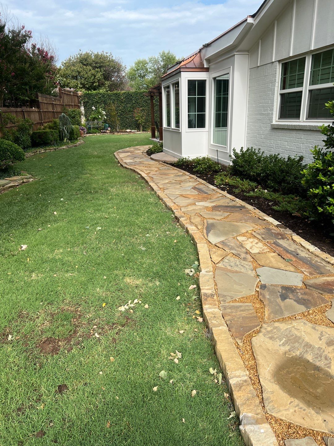 Flagstone walkway using Flagstone  by Clays Services Inc