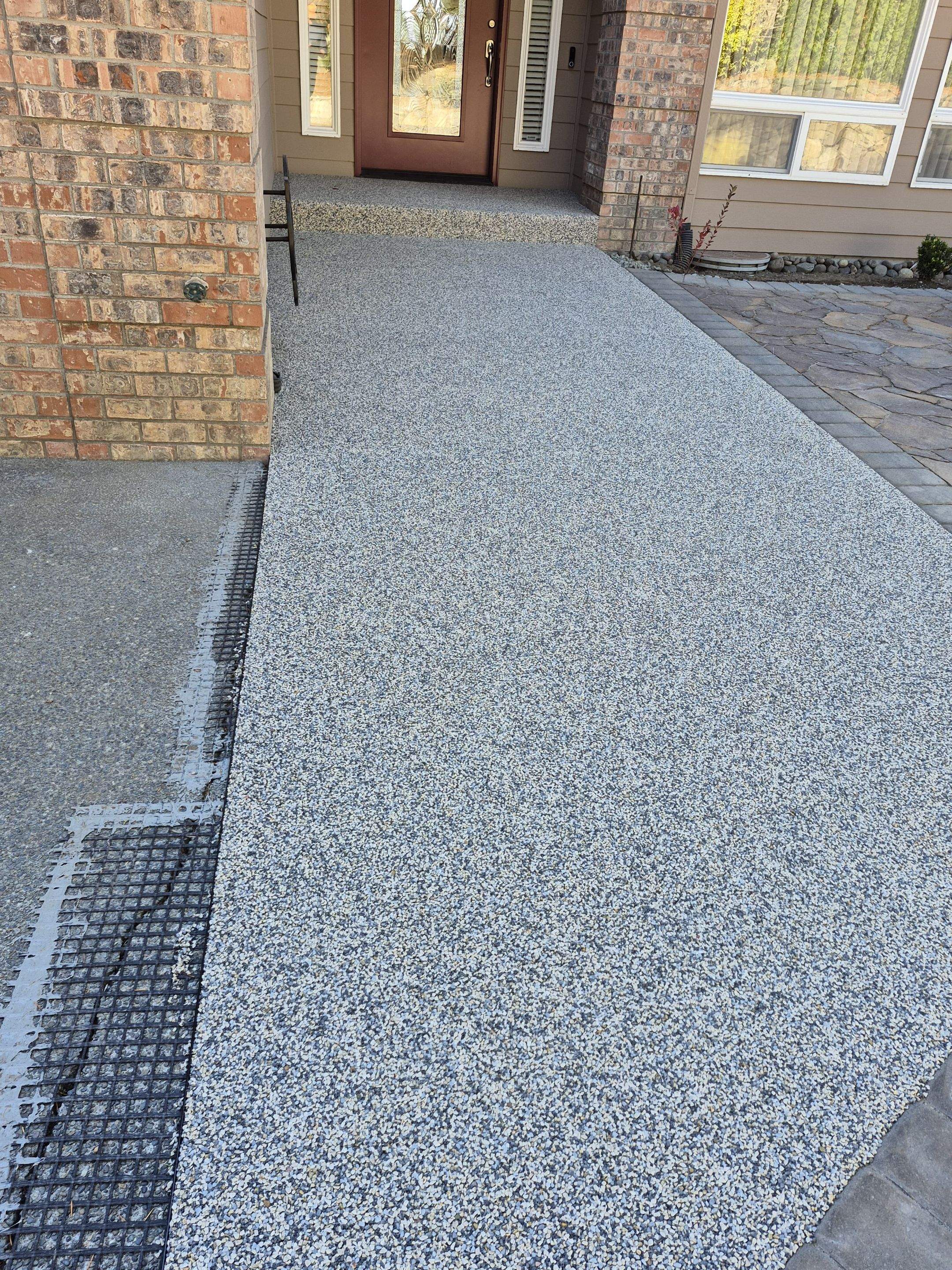Stylish Walkway and Patio in Tennessee Vuba Stone by Concrete Coating Experts Inc.