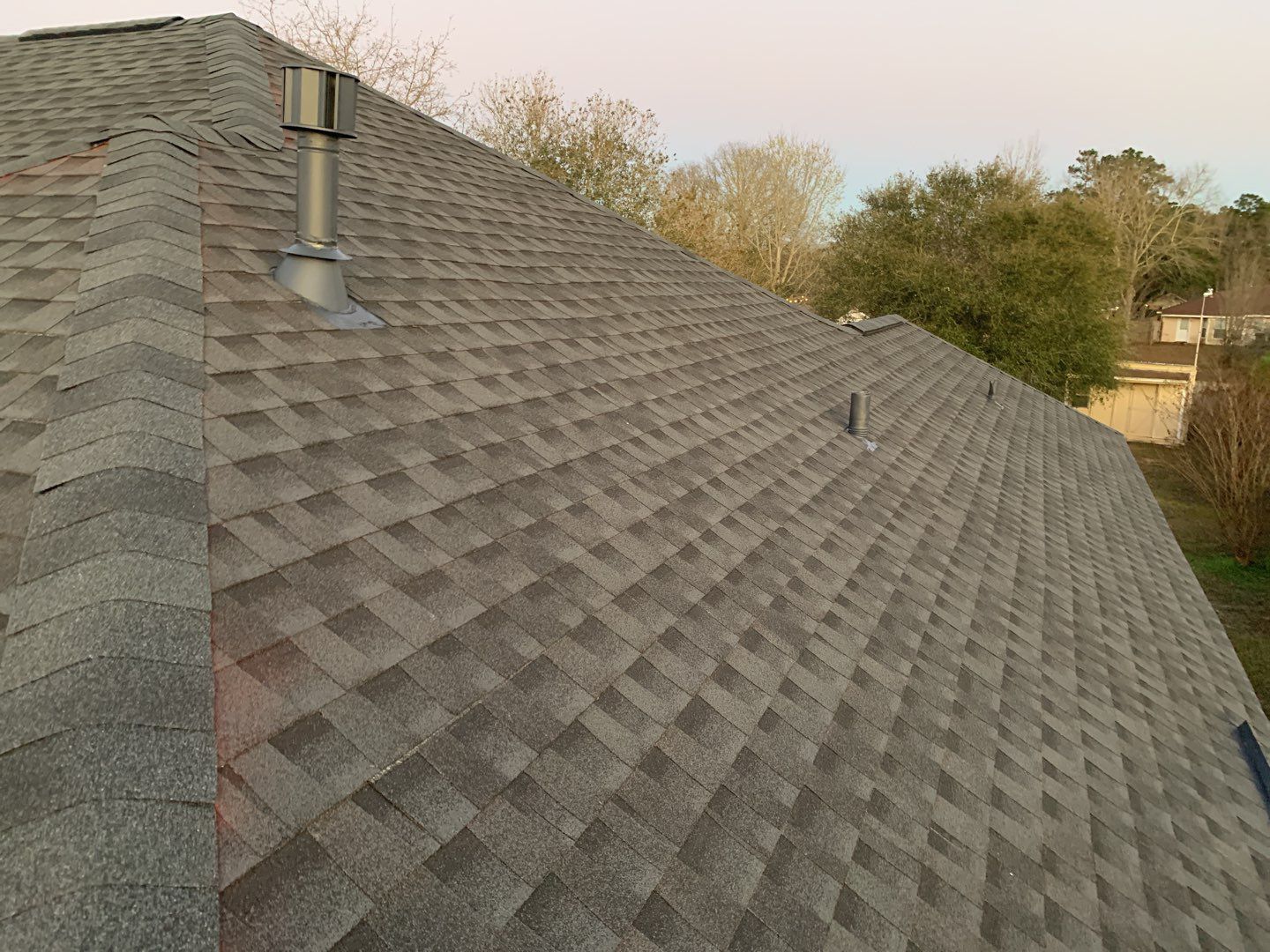 Residential Roofing Installation using Roof Replacement by American Roofing & Construction LLC