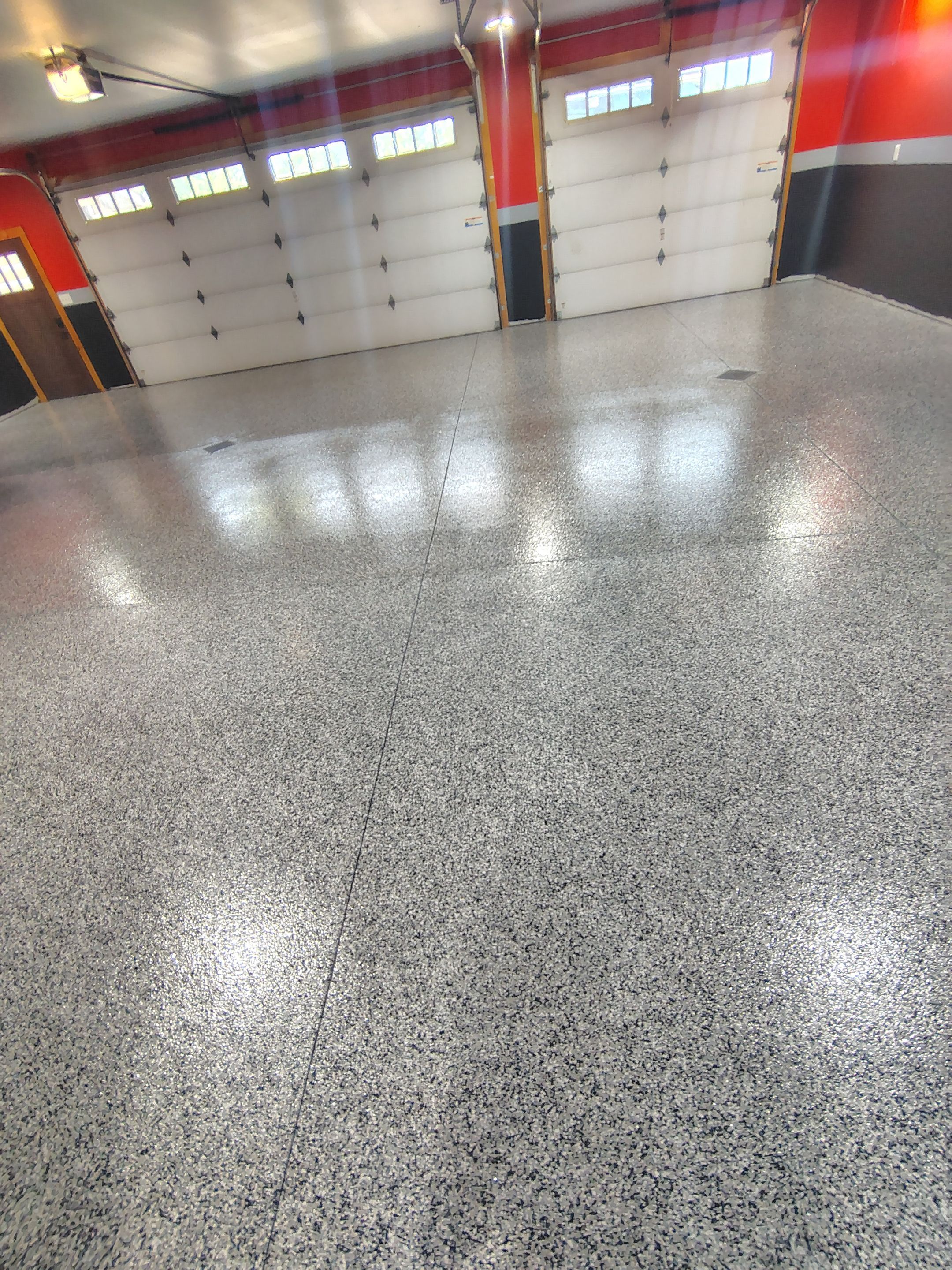 Multi-Car Garage Concrete Coating and Floor Refinishing in Hull by Select Painting, Coatings & Garage Cabinets