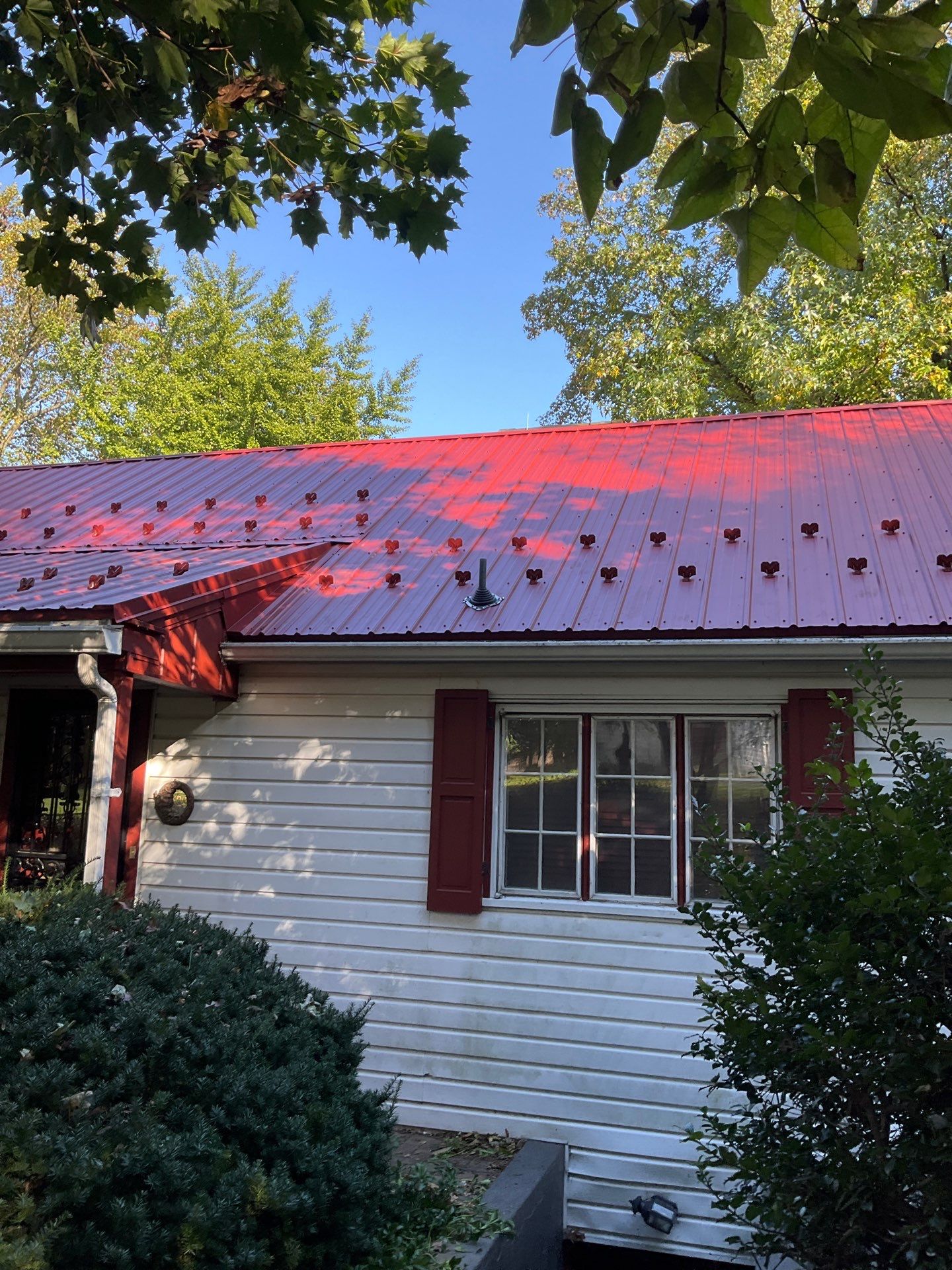 Red Metal Roofing Installation and Trim Restoration in Bernville by Esh Builders