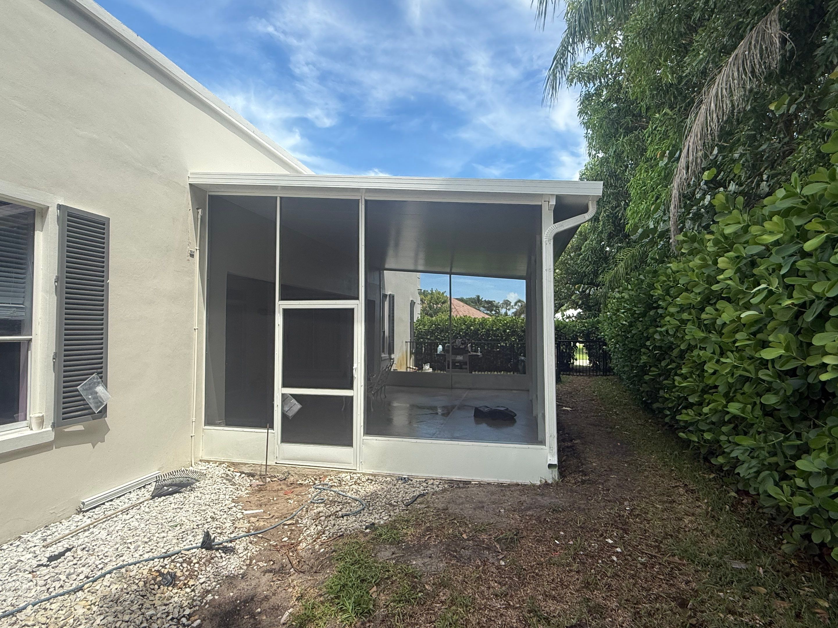 Aluminum Insulated Roof and Screen Enclosure Installation in Atlantis by The Screen Depot, Inc