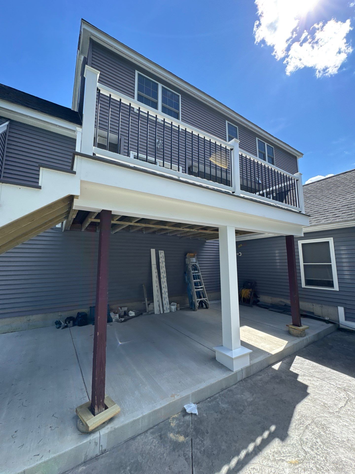 Roof, Trim, Deck, and Gutter Restoration by Mighty Dog Roofing of Greater Middlesex County
