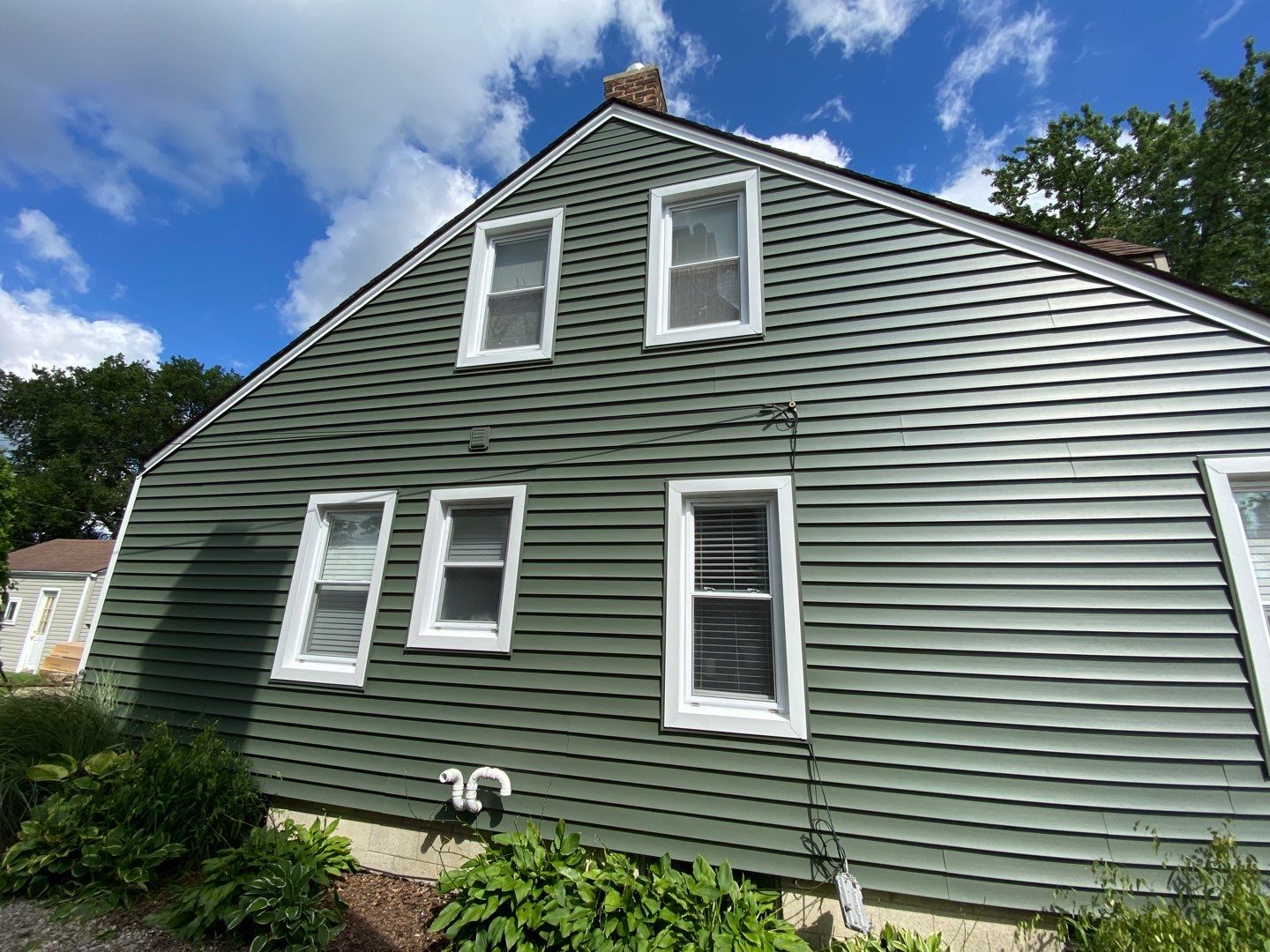 Siding Replacement using CertainTeed Restoration Classic D5 Forest Green by 180 Contractors