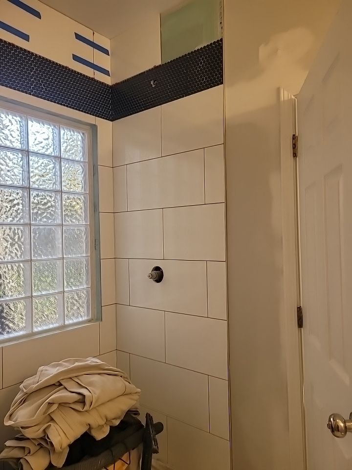 Cozy, Modernized Bathroom Retreat in Cary by Elite Remodeling and Design LLC