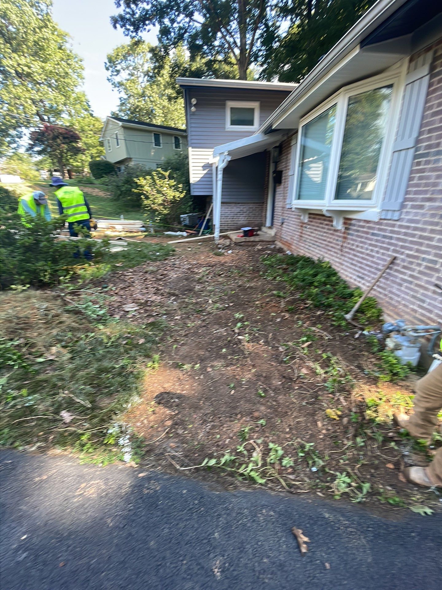 New walkway with stairs and a new front porch by Fairfax Contractors, LLC