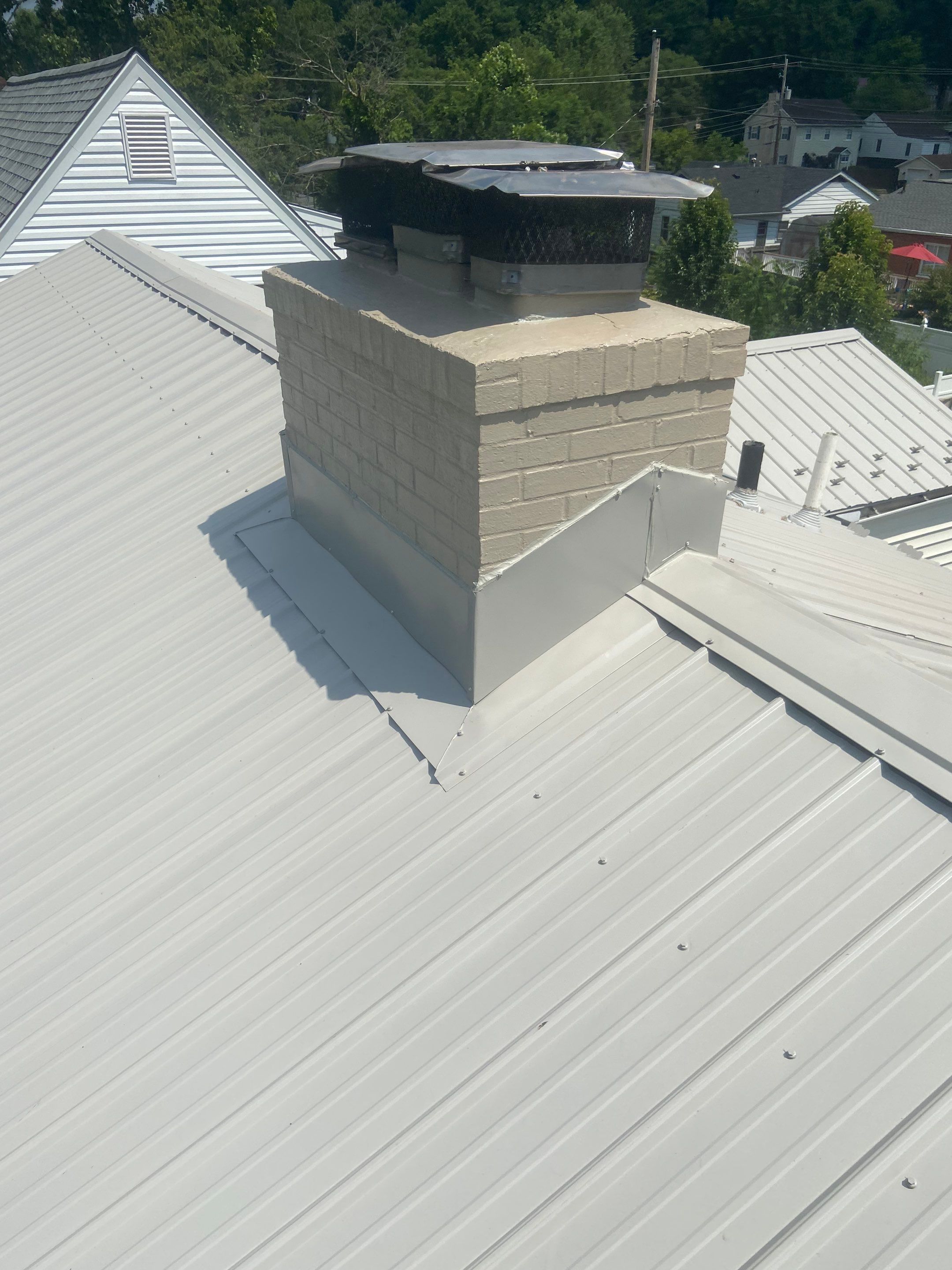 Metal Roofing, Skylights, Porch Build by Secure Construction Company Inc
