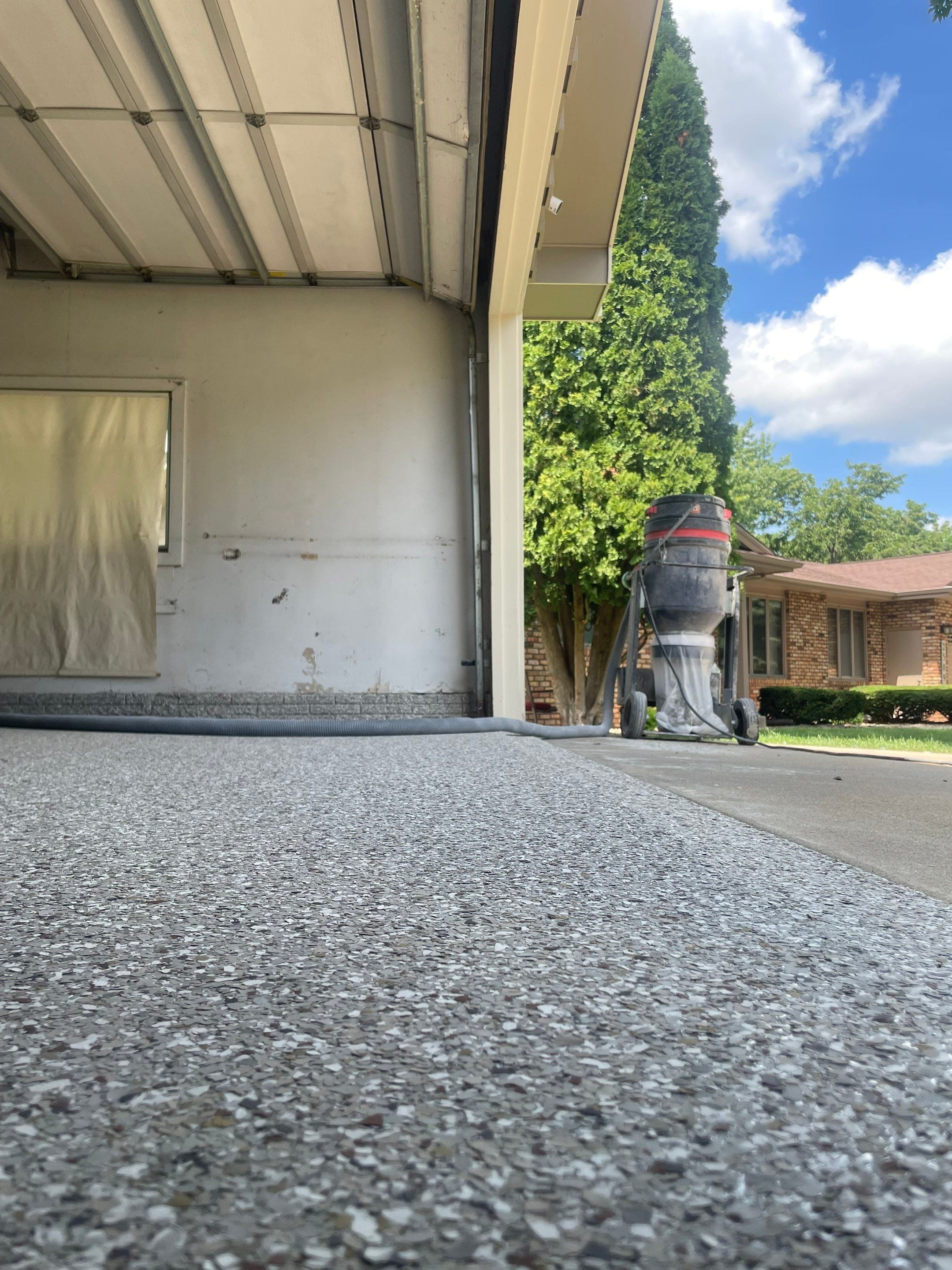 Custom Creekbed Garage Floor Coating in Sioux Falls by Select Painting, Coatings & Garage Cabinets