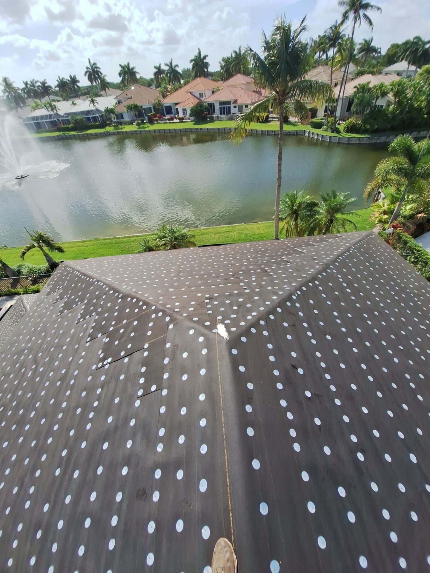 Residential Roofing Installation using 1" Nail strip metal roof by BLUES BROTHERS ROOFING