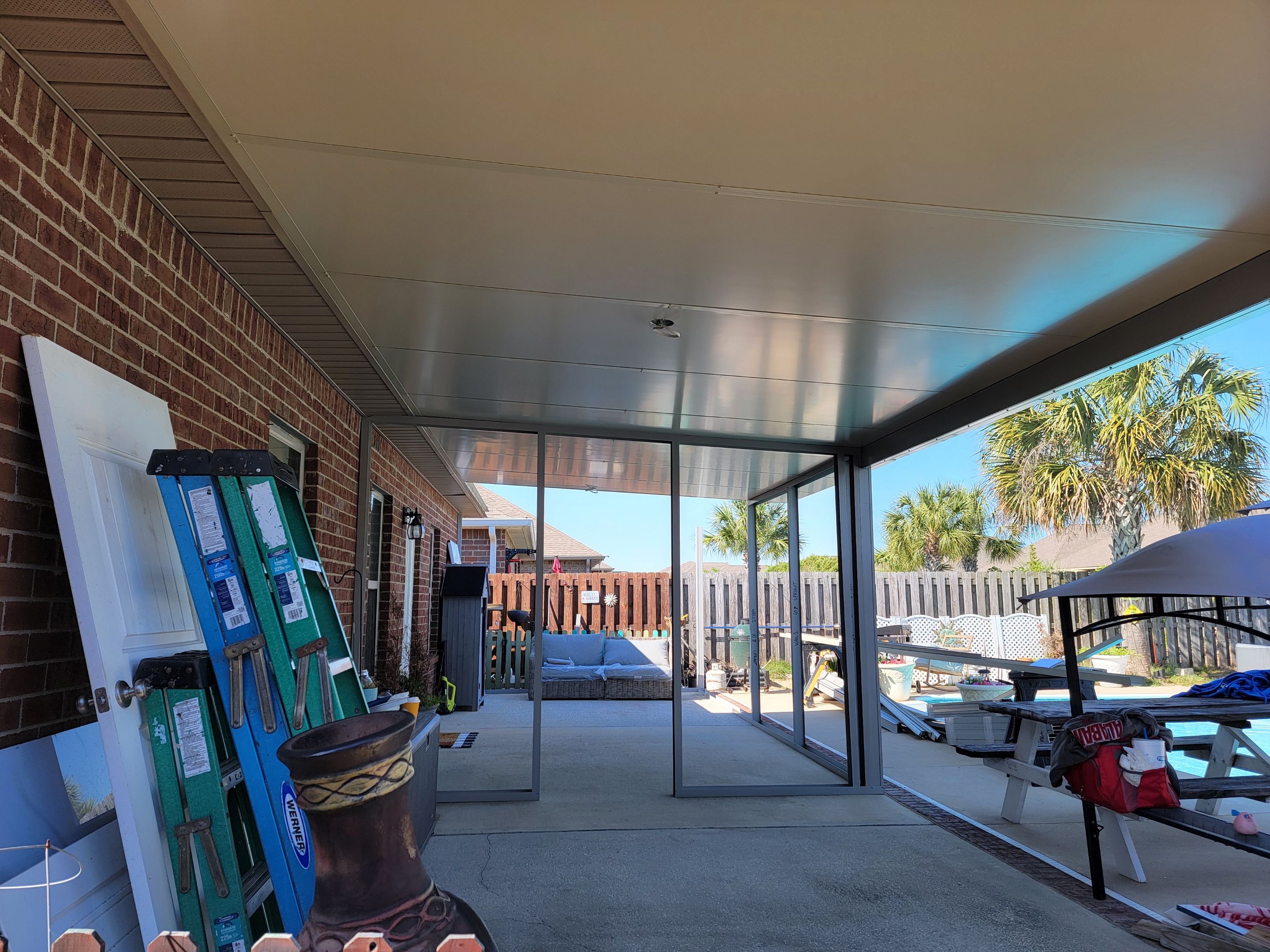 Poolside Screen Room & Patio Cover in Gulf Breeze by Titan Sunrooms