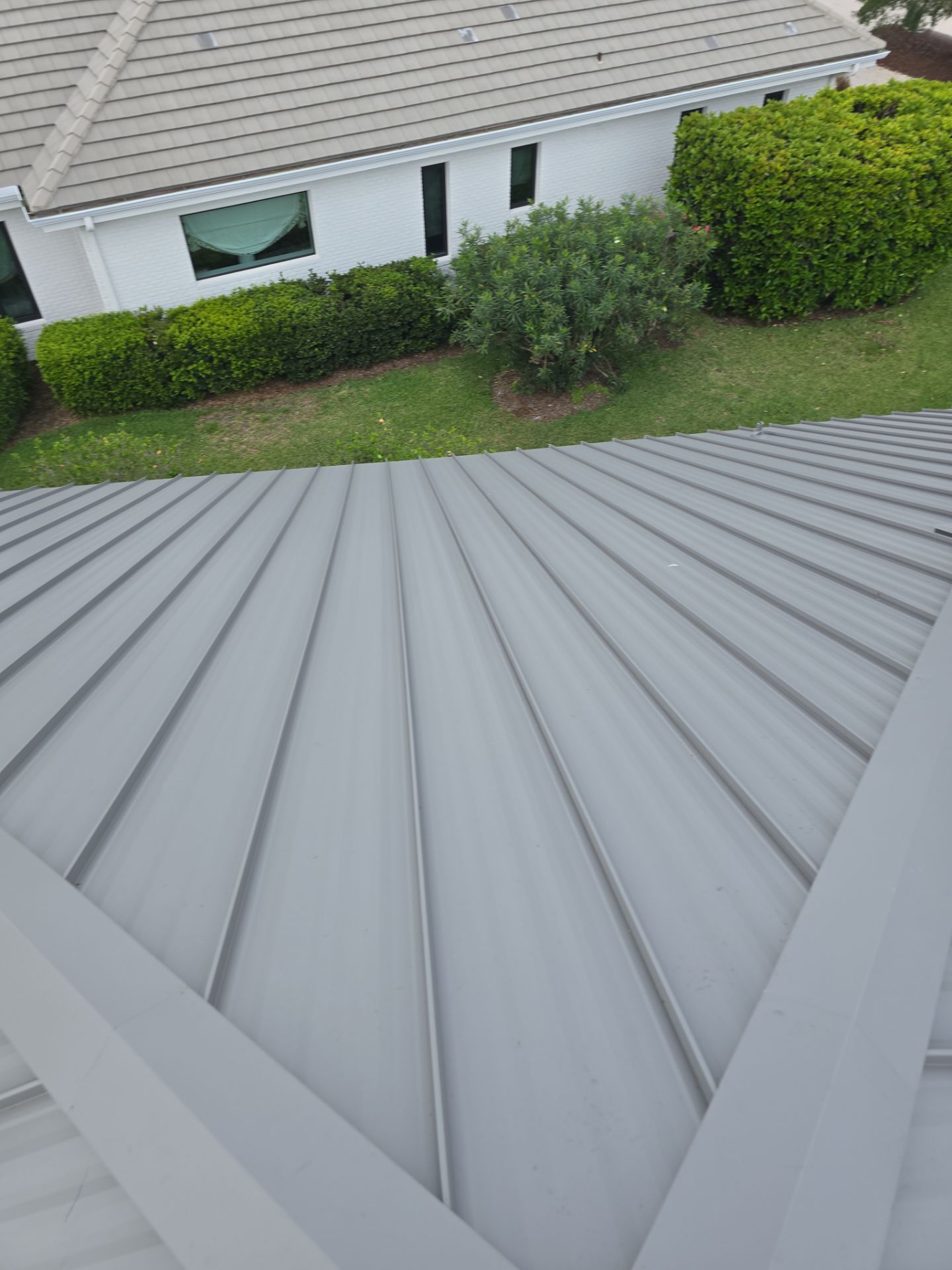 Kynar (Color Coated) 1.5" Standing Seam Metal Roof Installation by Sailfish Roofing