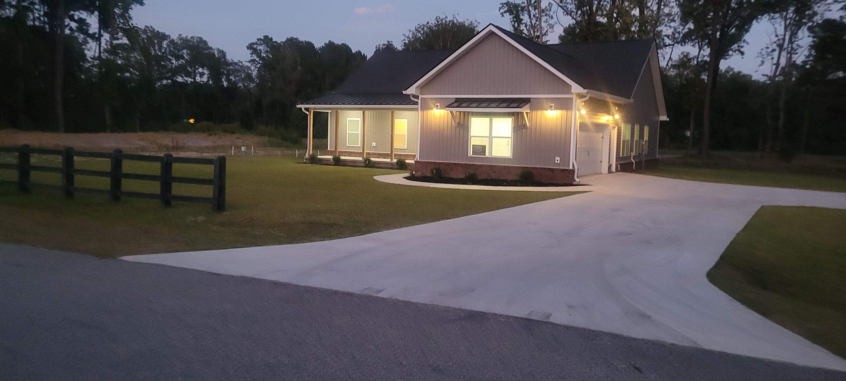 New Home Construction using brick and vertical vinyl by Cornerstone Home Builders, LLC