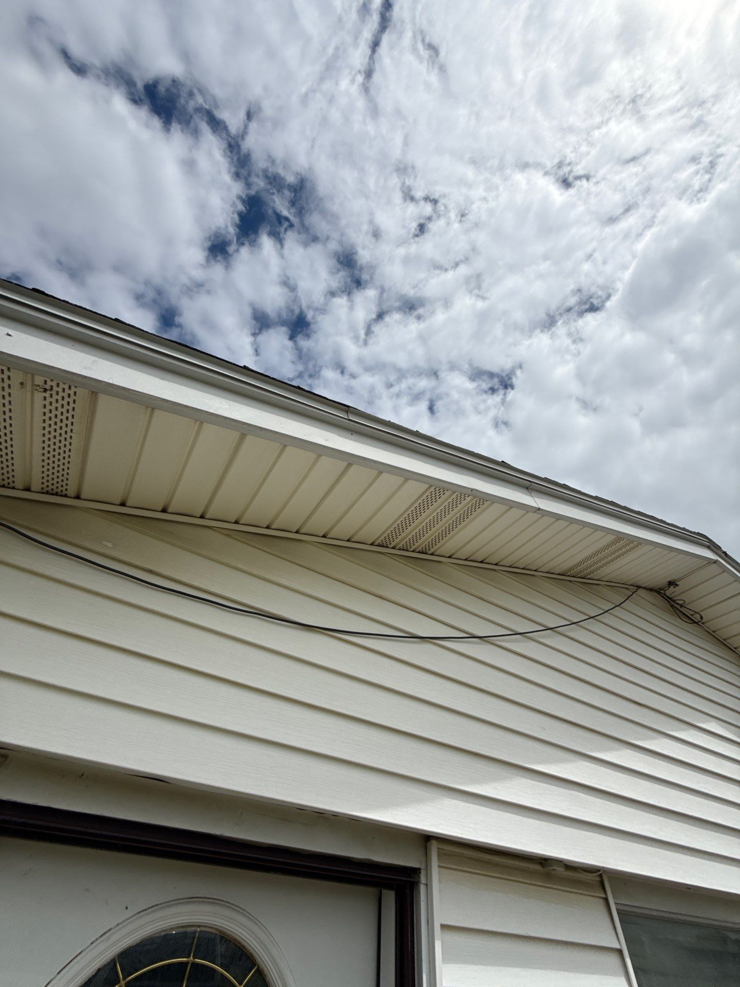 New roof & siding paid by insurance. Along with new roof sheathing.  by In & Out Construction & Remodeling, LLC