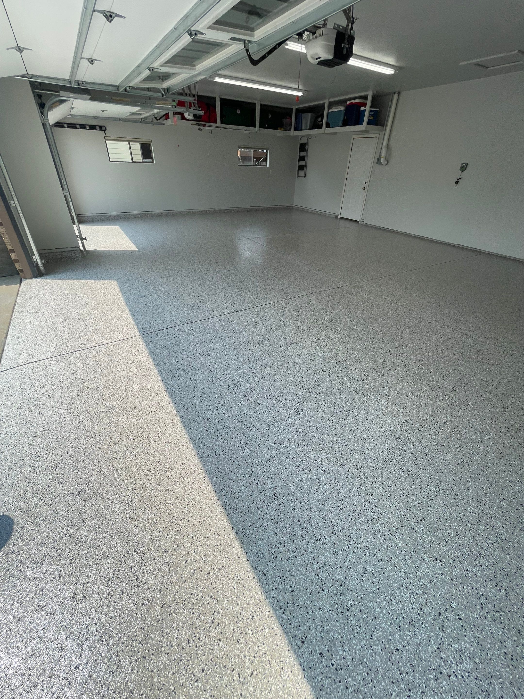 Multi-Car Garage Floor Coating and Crack Repair in Tea by Select Painting, Coatings & Garage Cabinets