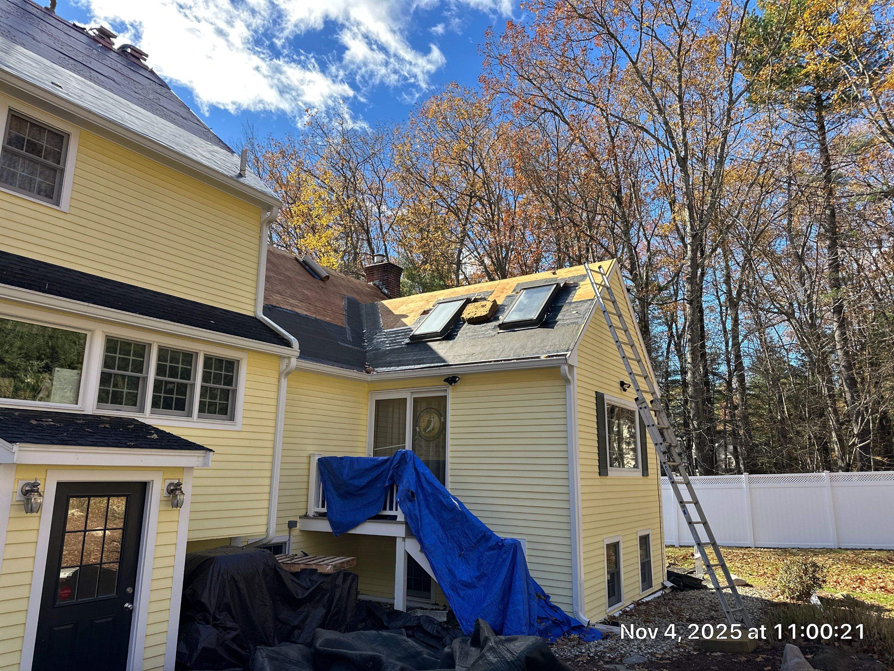 Chelmsford Premium Roof: Onyx Black Shingles with Standing Seam Metal Porch by Mighty Dog Roofing of Greater Middlesex County