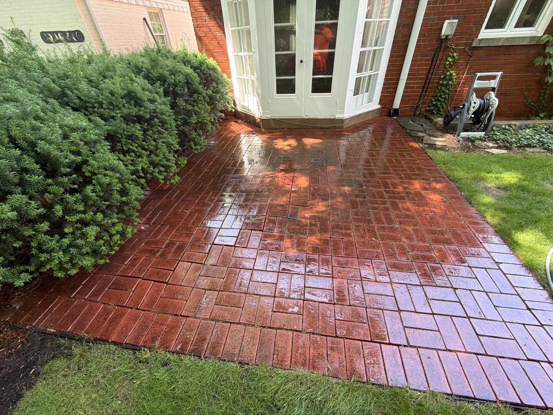 Brick Paver cleaning, sanding, seal by Northern Power Washing LLC.