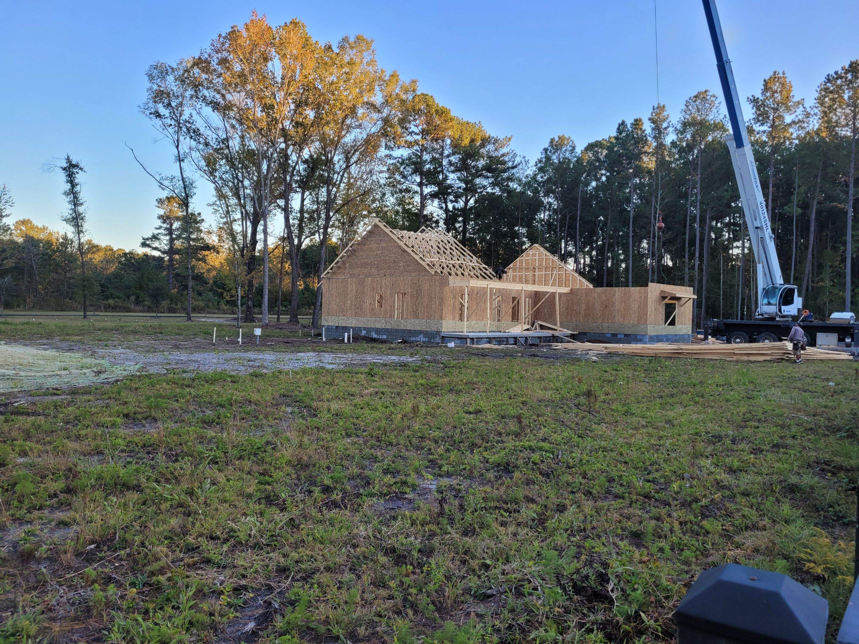 New Home Construction using brick and vertical vinyl by Cornerstone Home Builders, LLC