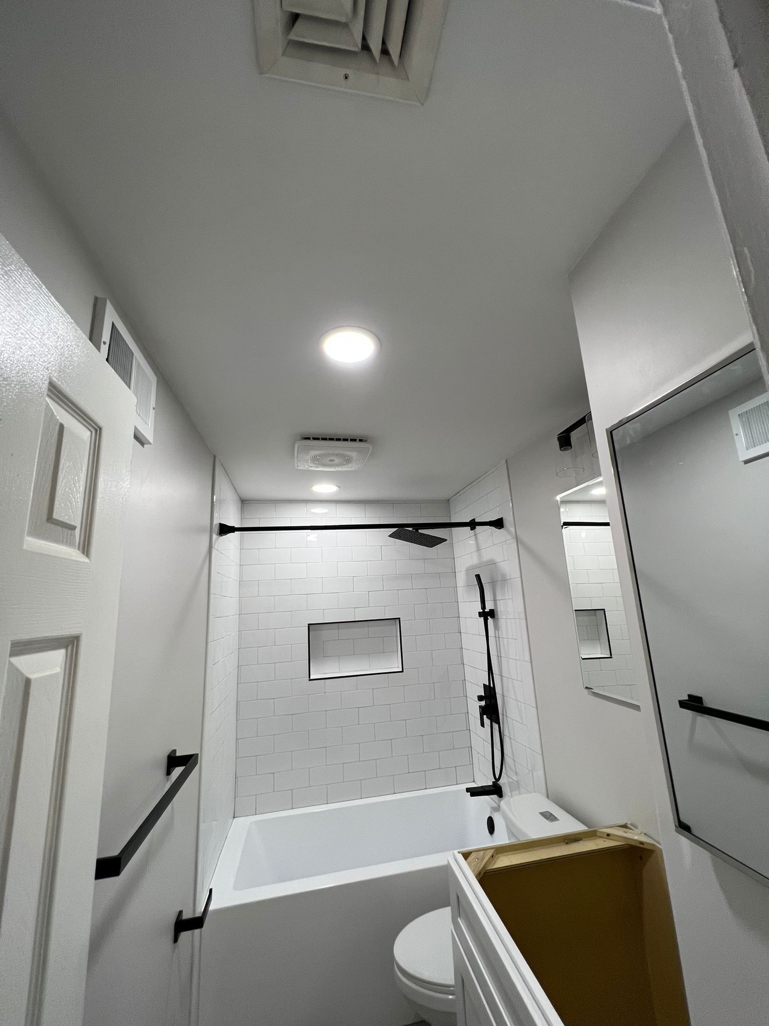 Bathroom Remodel using Cabinets by Home Concepts Construction