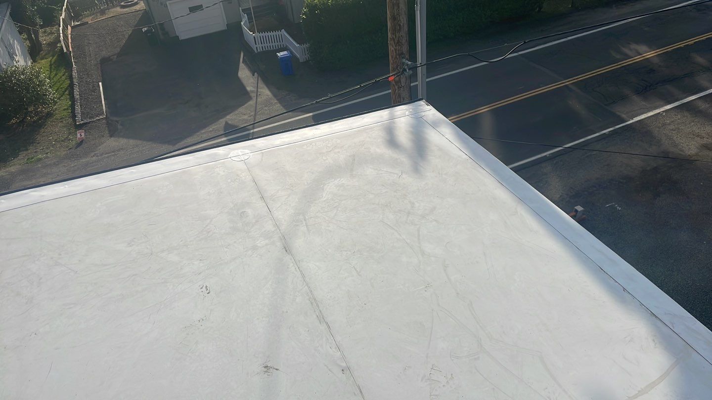 Commercial Roofing Installation using GAF 60Mil TPO  by Orezona Building & Roofing Company, Inc.