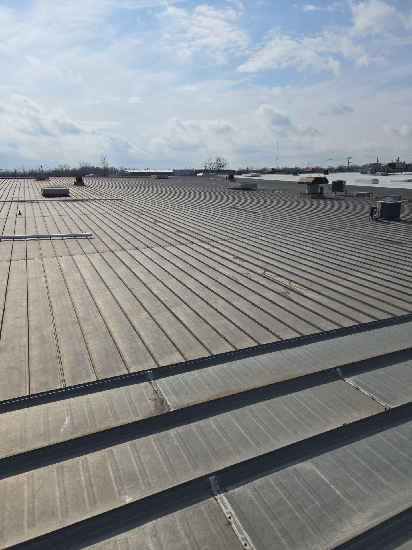 Commercial Metal and Flat Roof Repairs in Mason, Ohio by Level Up Roofing and Restoration Services LLC