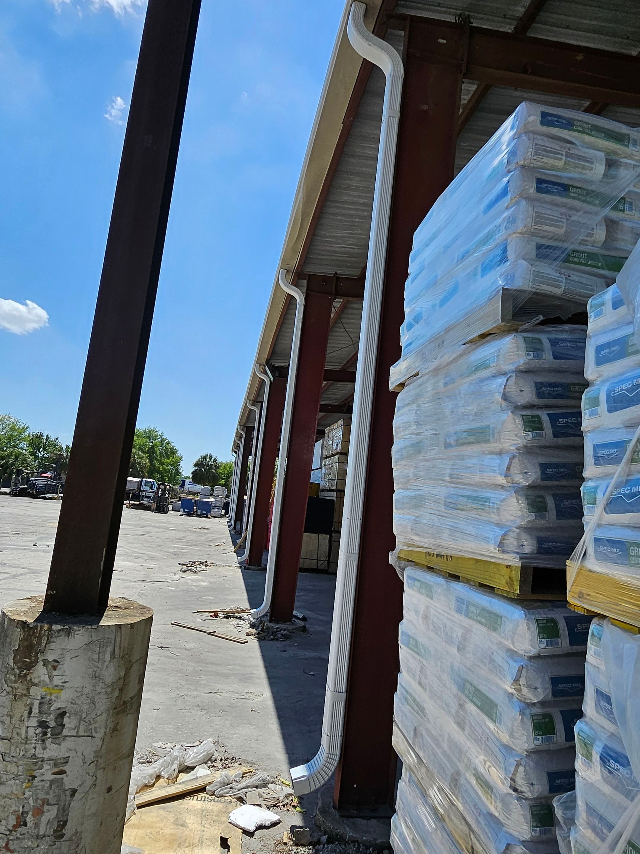 Commercial Box Gutters and White Downspouts Installation in Tampa FL by Gutter Professors