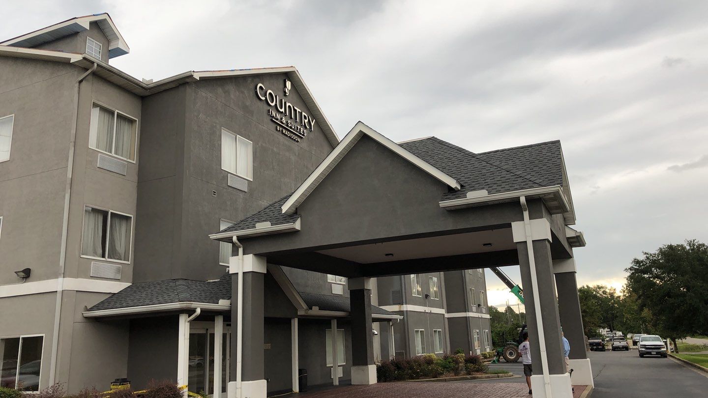 Commercial Roofing Installation using Roof Replacement by American Roofing & Construction LLC