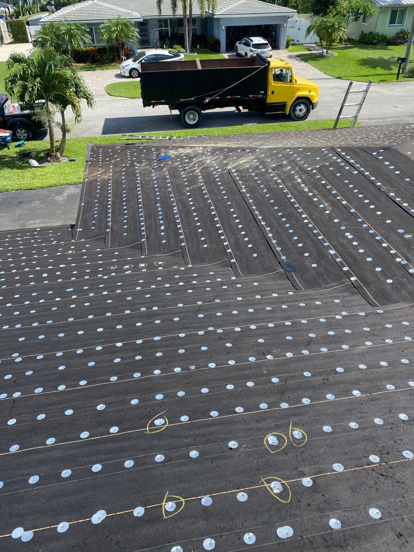 Residential Roofing Installation using 1" Nail strip metal roof by BLUES BROTHERS ROOFING