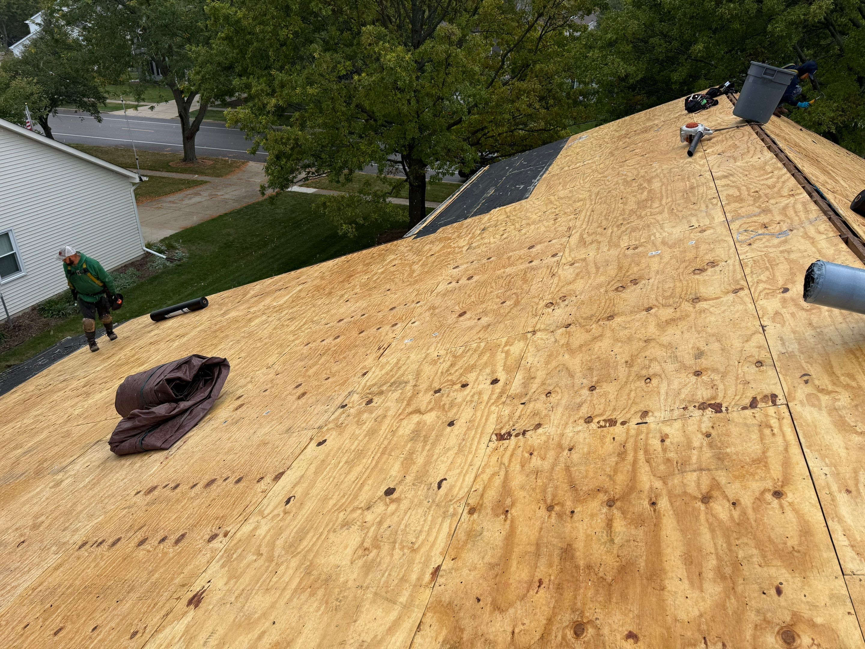 Roof & gutters by Optimal Home Improvement 