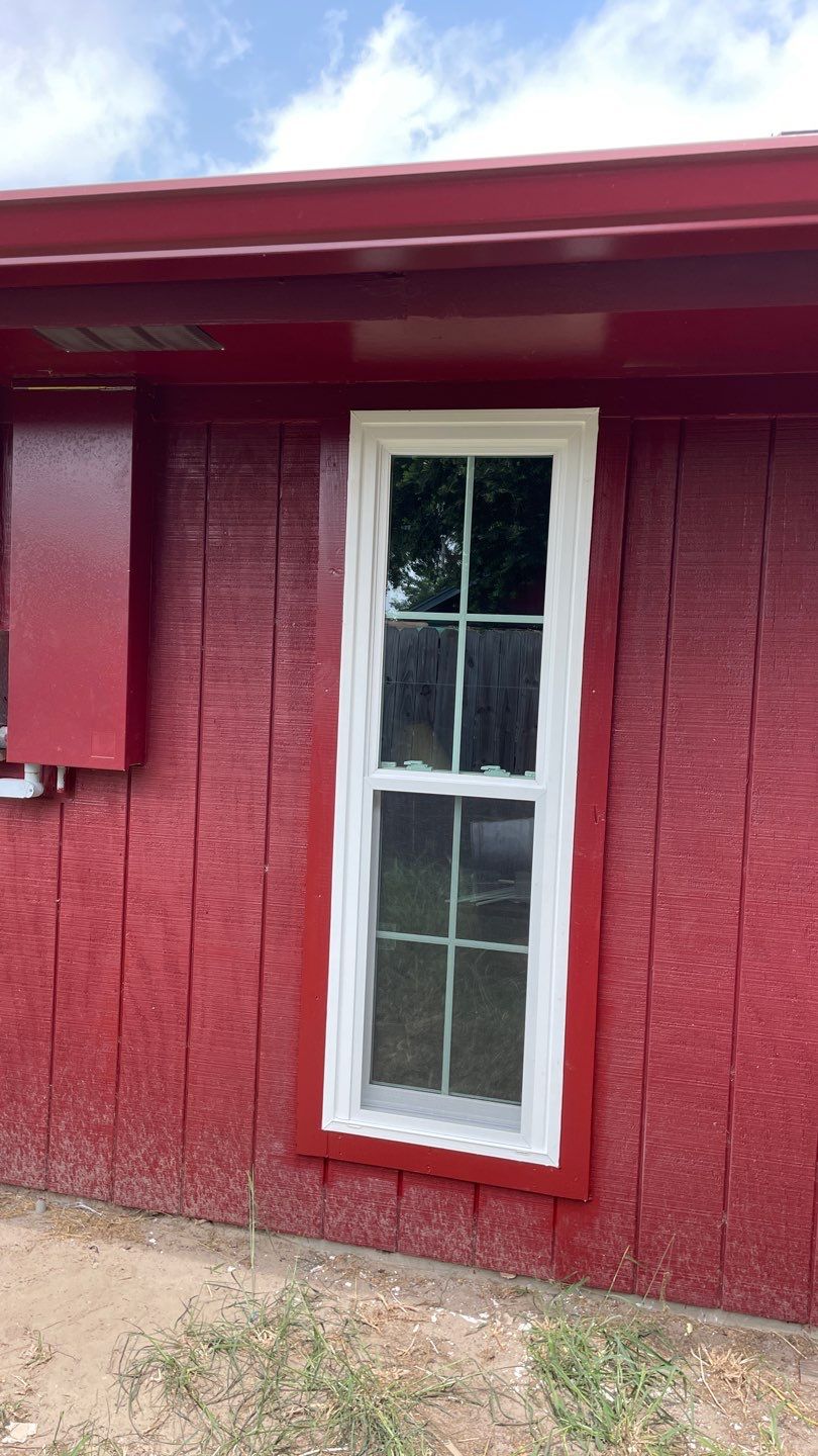 Black and white and red all over by Bayfront Roofing and Construction