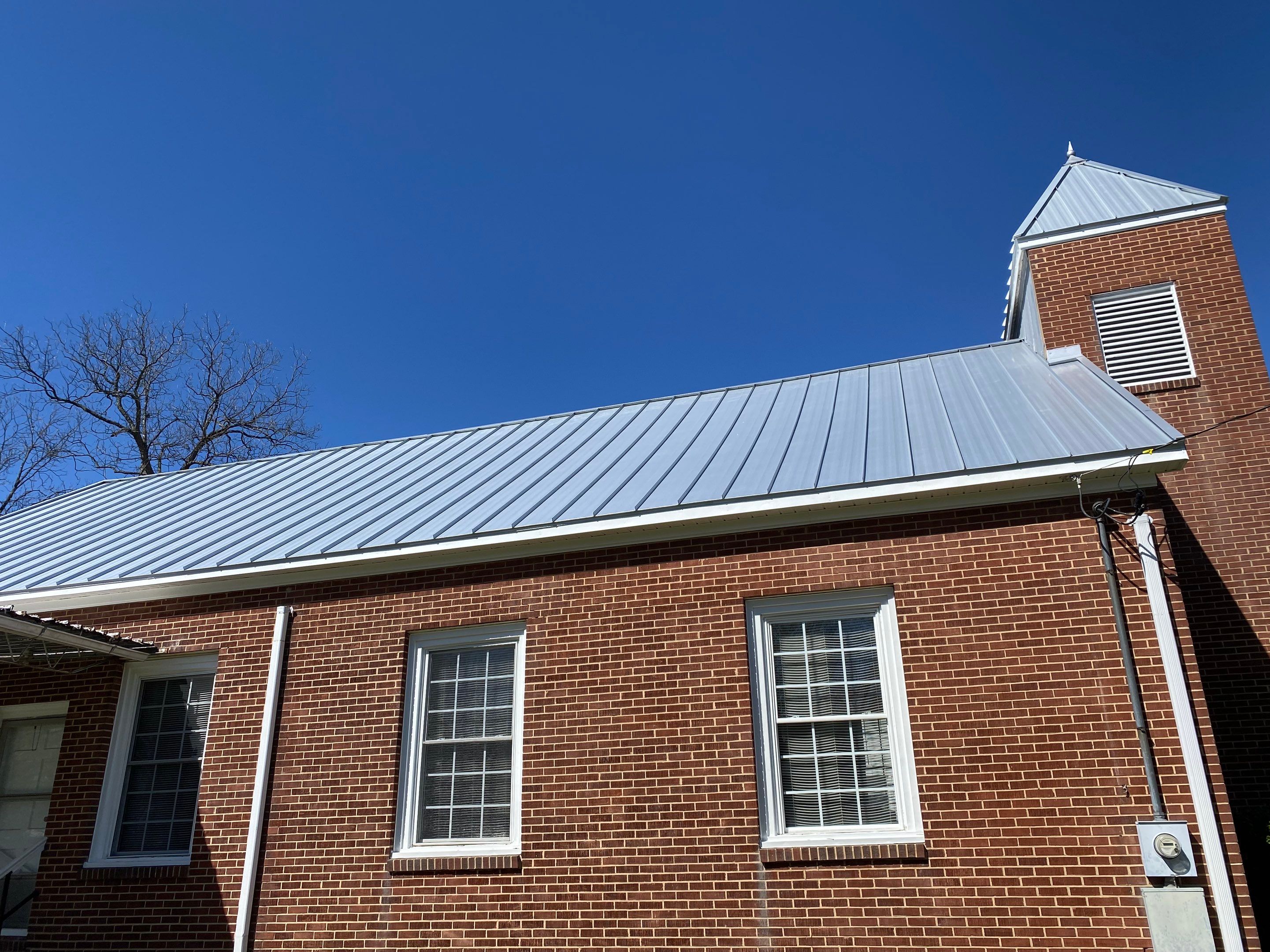 Primitive Baptist Church using Standing Seam Metal by Just In Time Roofing and Restoration