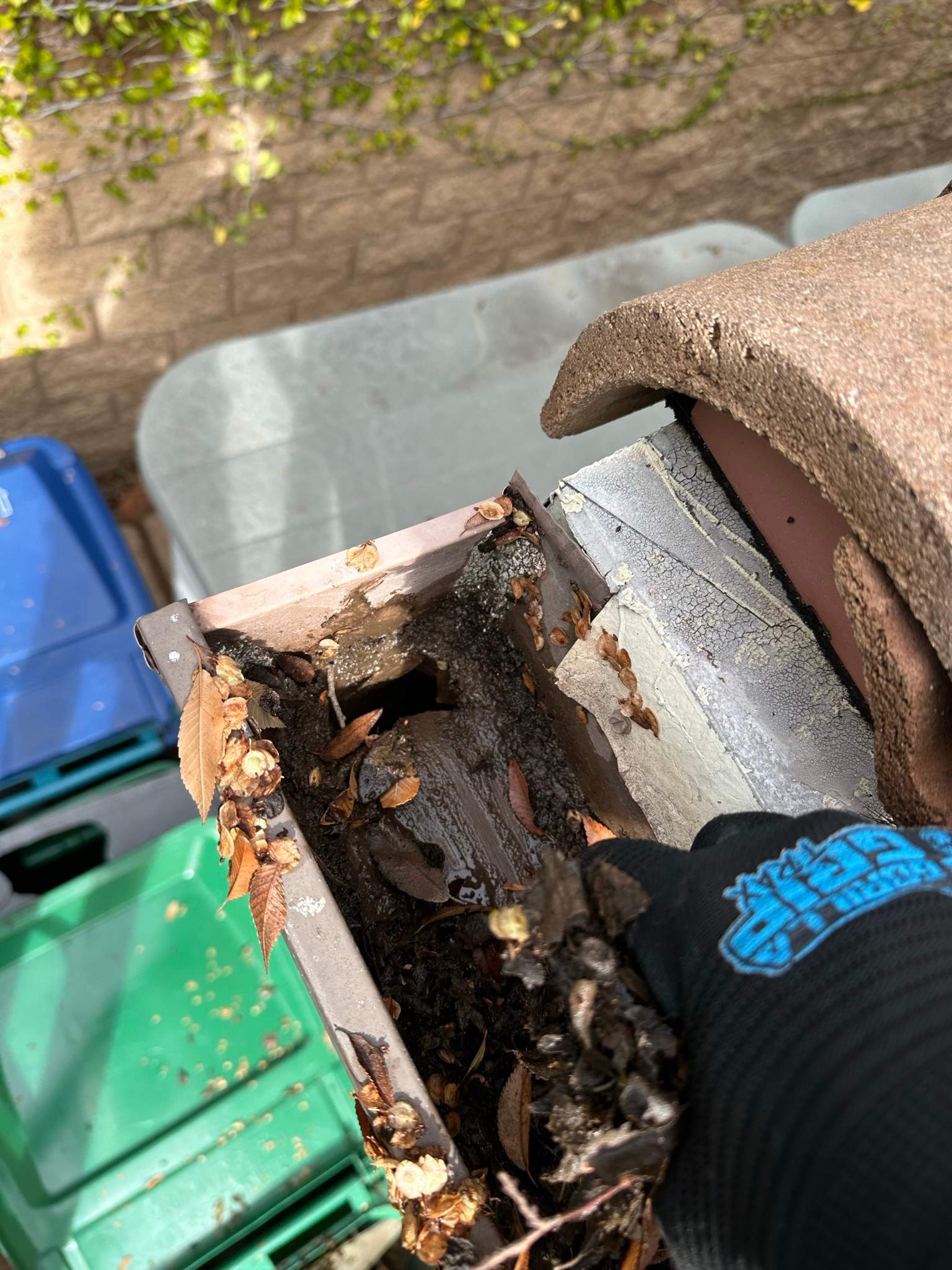 Clogged gutters at this Irvine home in Woodbury by Property Cleaning Experts, LLC