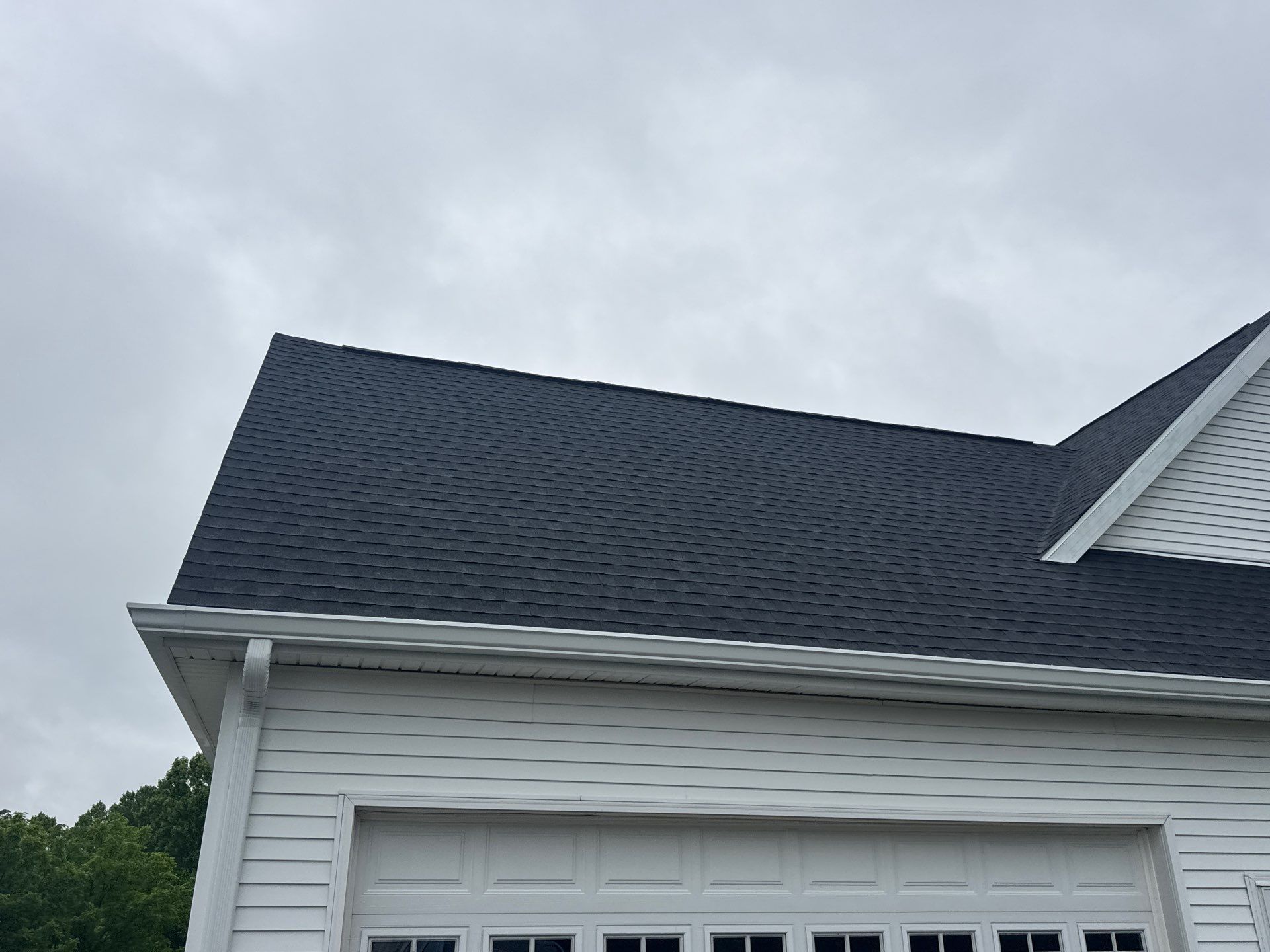 Residential Roofing Installation using GAF Timberline HDZ Charcoal by Rainstoppers Roofing