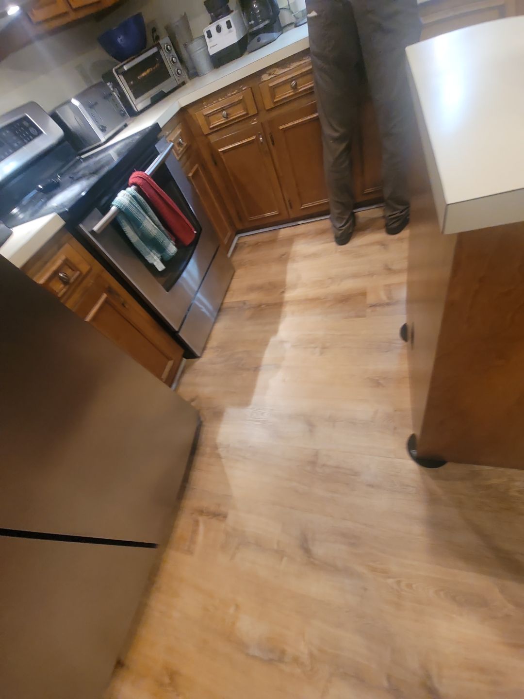 A Pathway to Personality – A Two-Tone Kitchen Transformation in Apex by Elite Remodeling and Design LLC