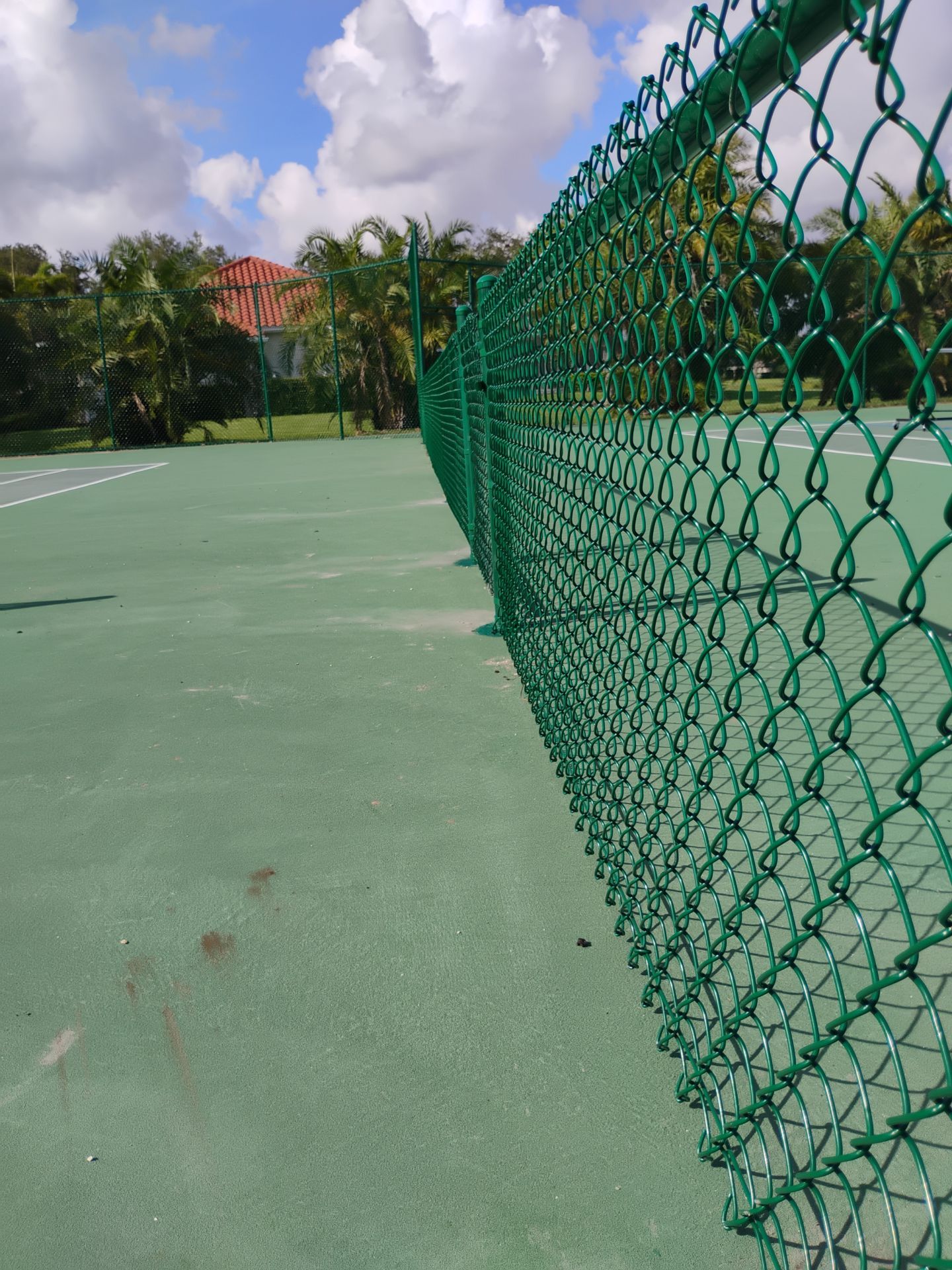 Commercial Tennis Court Chain Link Fence Repair in Sarasota by True Fence LLC