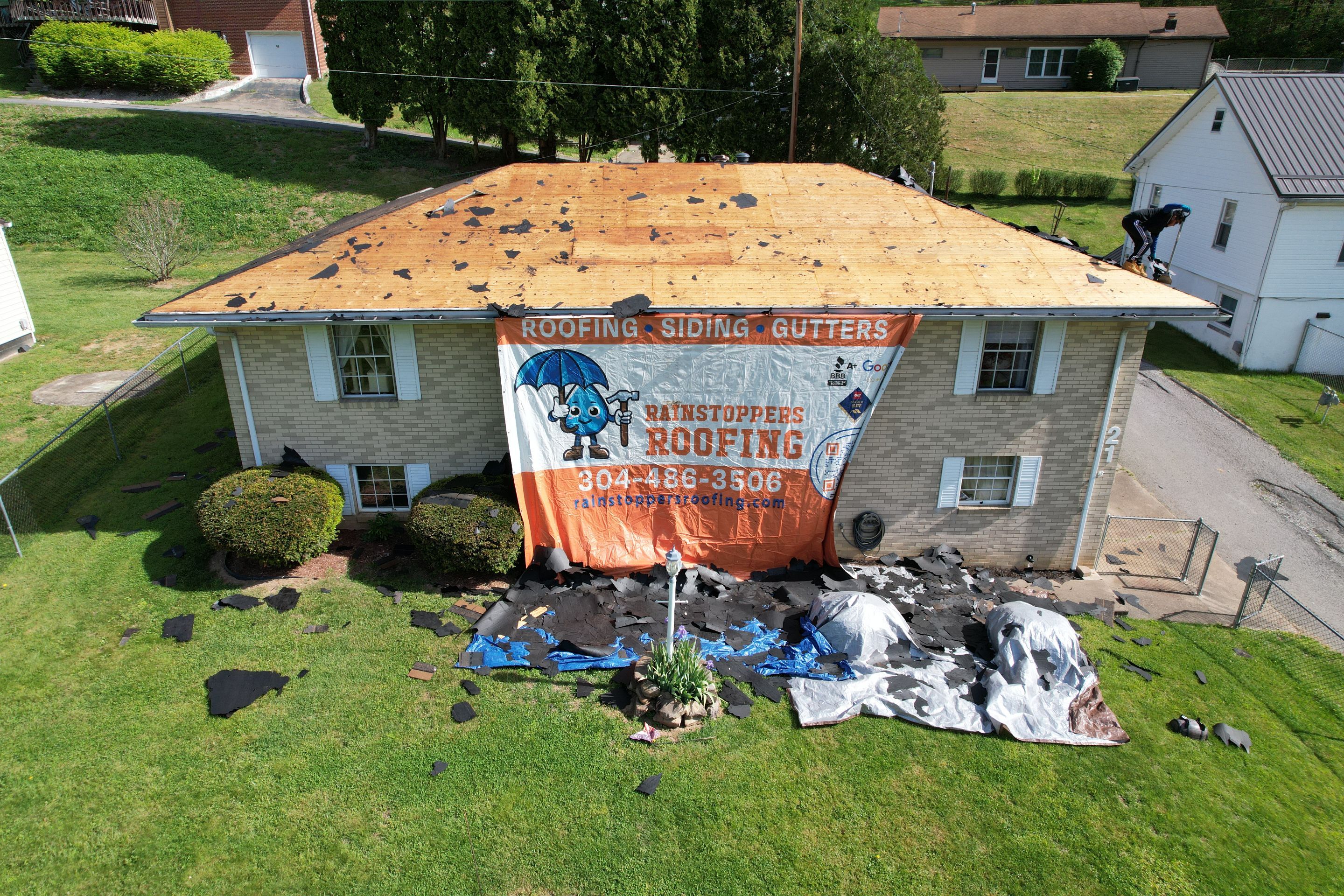 Residential Roofing Installation using GAF Timberline HDZ Charcoal by Rainstoppers Roofing