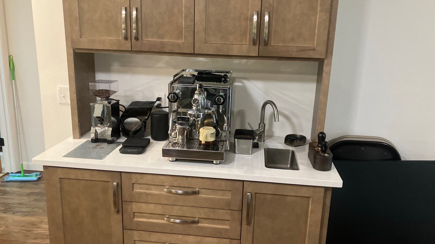 Beautiful Herringbone Backsplash  by Footprints Floors of Nashville