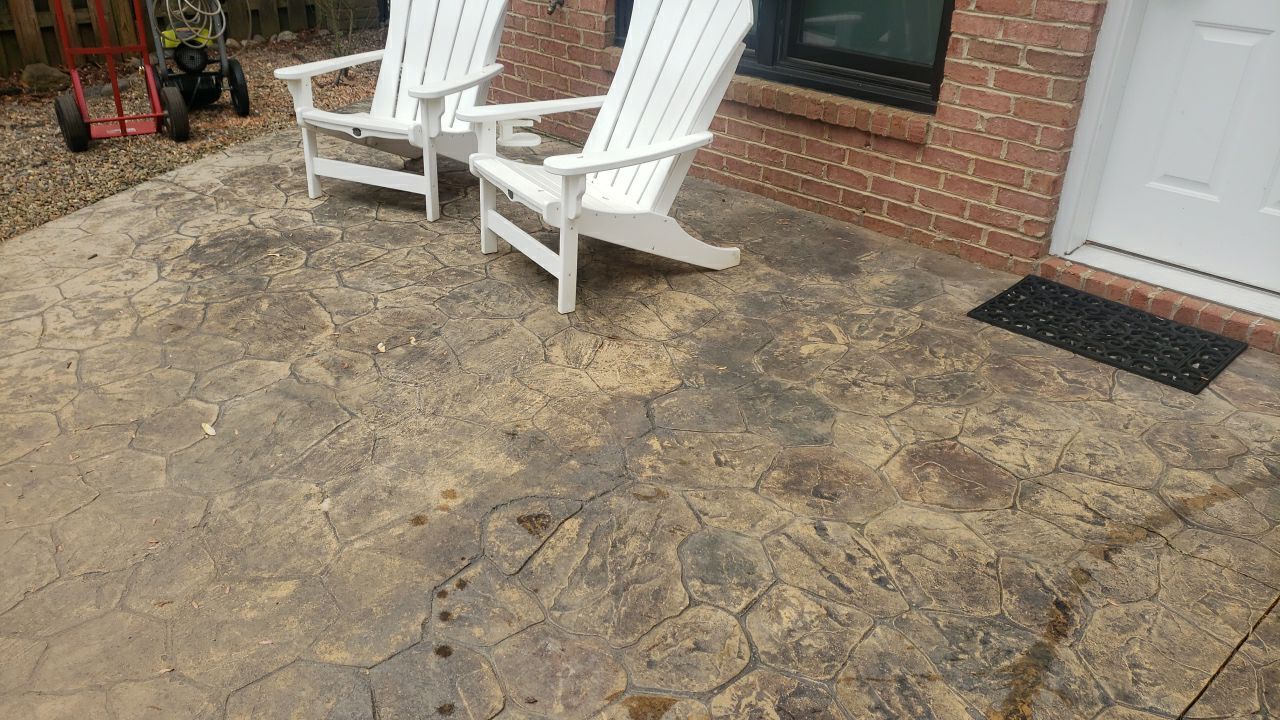 patio cleaning using cleaner by Power Wash Masters LLC